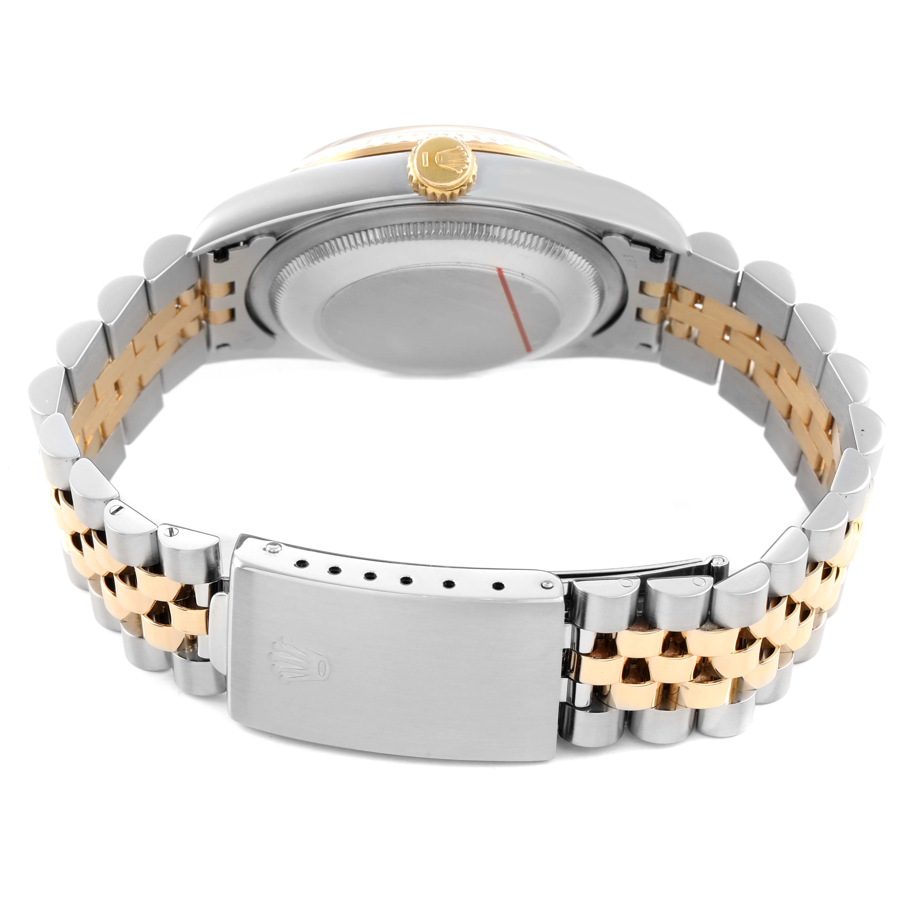 The image shows a Rolex Datejust 16233 Men's Steel and Gold (two tone) Champagne Dial watch from the back, highlighting the case back, crown, and two-tone bracelet with clasp.