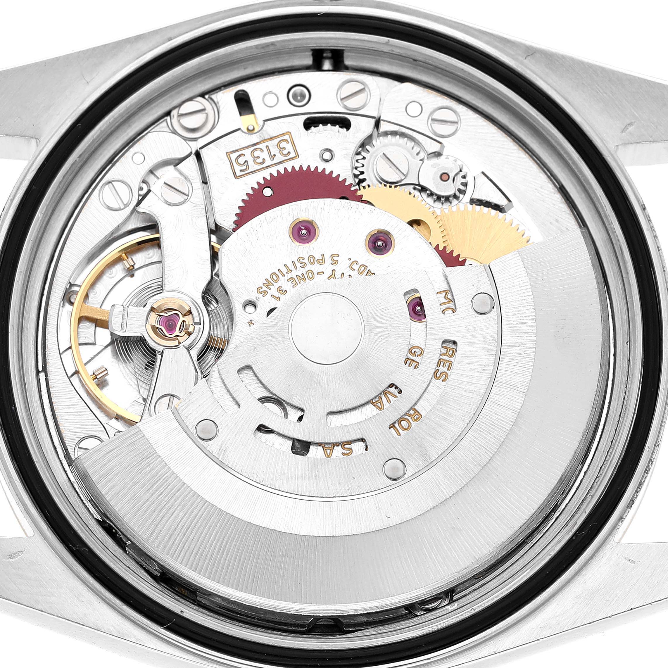 The image shows the Rolex Datejust 16233 Men's Stainless Steel Champagne Dial's internal movement from the back, revealing gears and the rotor.