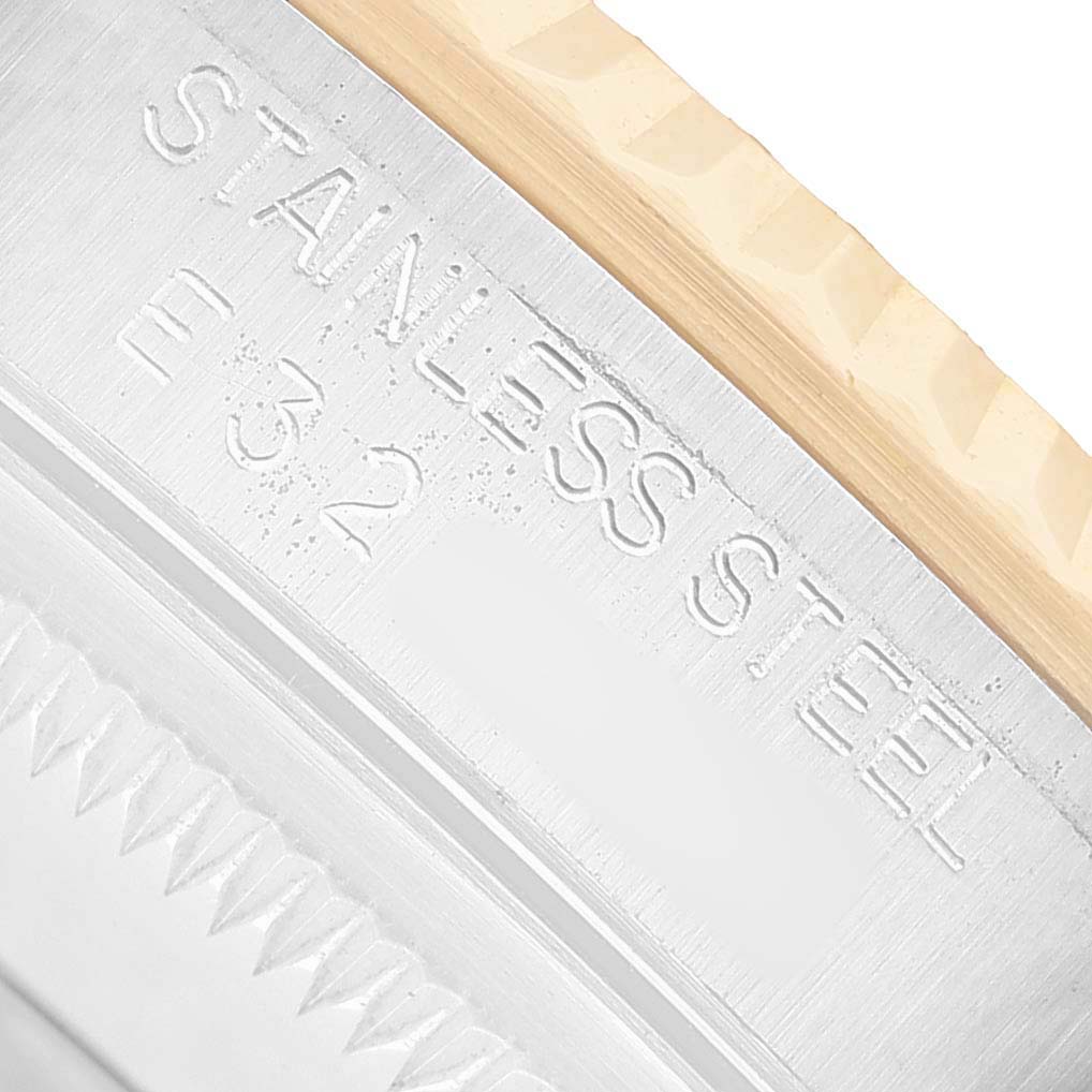 The image shows a close-up angle of the Rolex Datejust 16233 Men's Stainless Steel Champagne Dial's case side, highlighting the "STAINLESS STEEL" inscription.