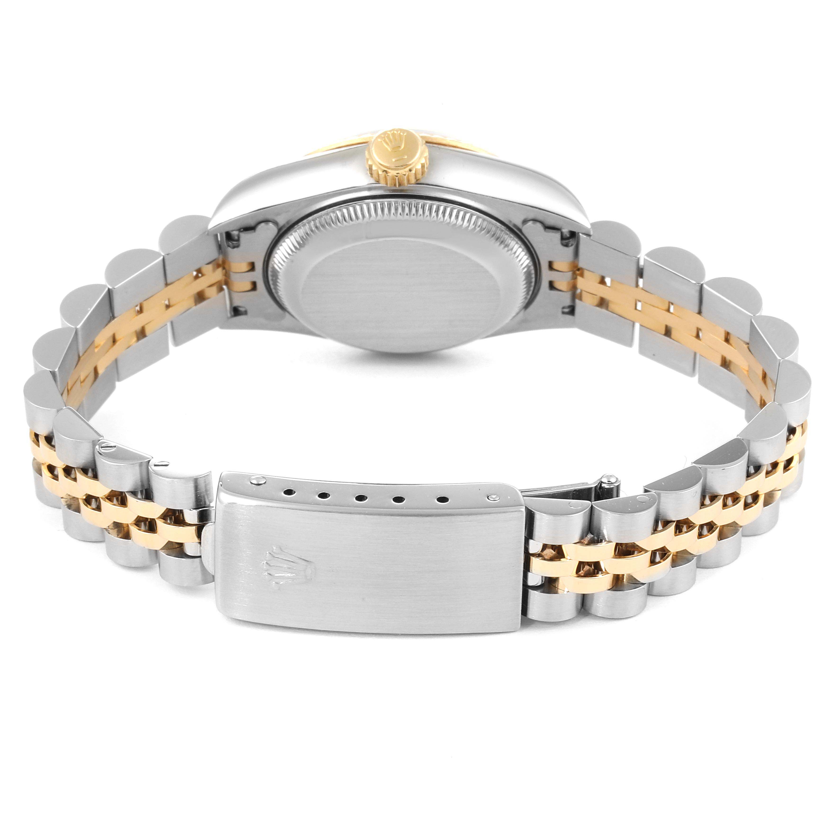 The image shows the back view of a Rolex Datejust 69173 Women's Steel and Gold (two tone) White Dial 69173 Women's Steel and Gold (two tone) White Dial watch, focusing on its stainless steel and gold bracelet as well as the clasp.