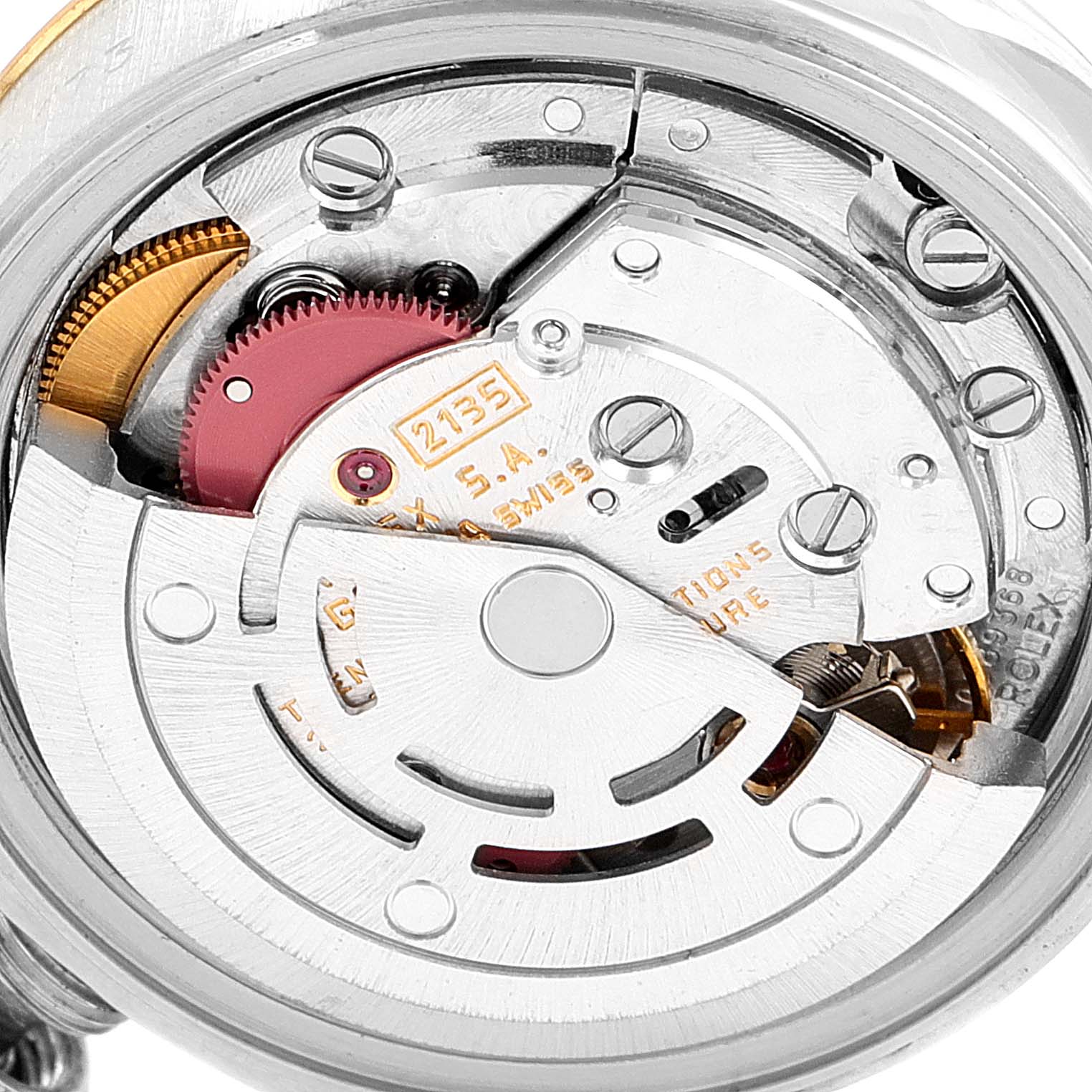 This is a close-up of the internal mechanism of a Rolex Datejust 69173 Women
s Steel and Gold (two tone) Silver Dial 69173 Women
s Steel and Gold (two tone) Silver Dial watch, showing gears and movement components.