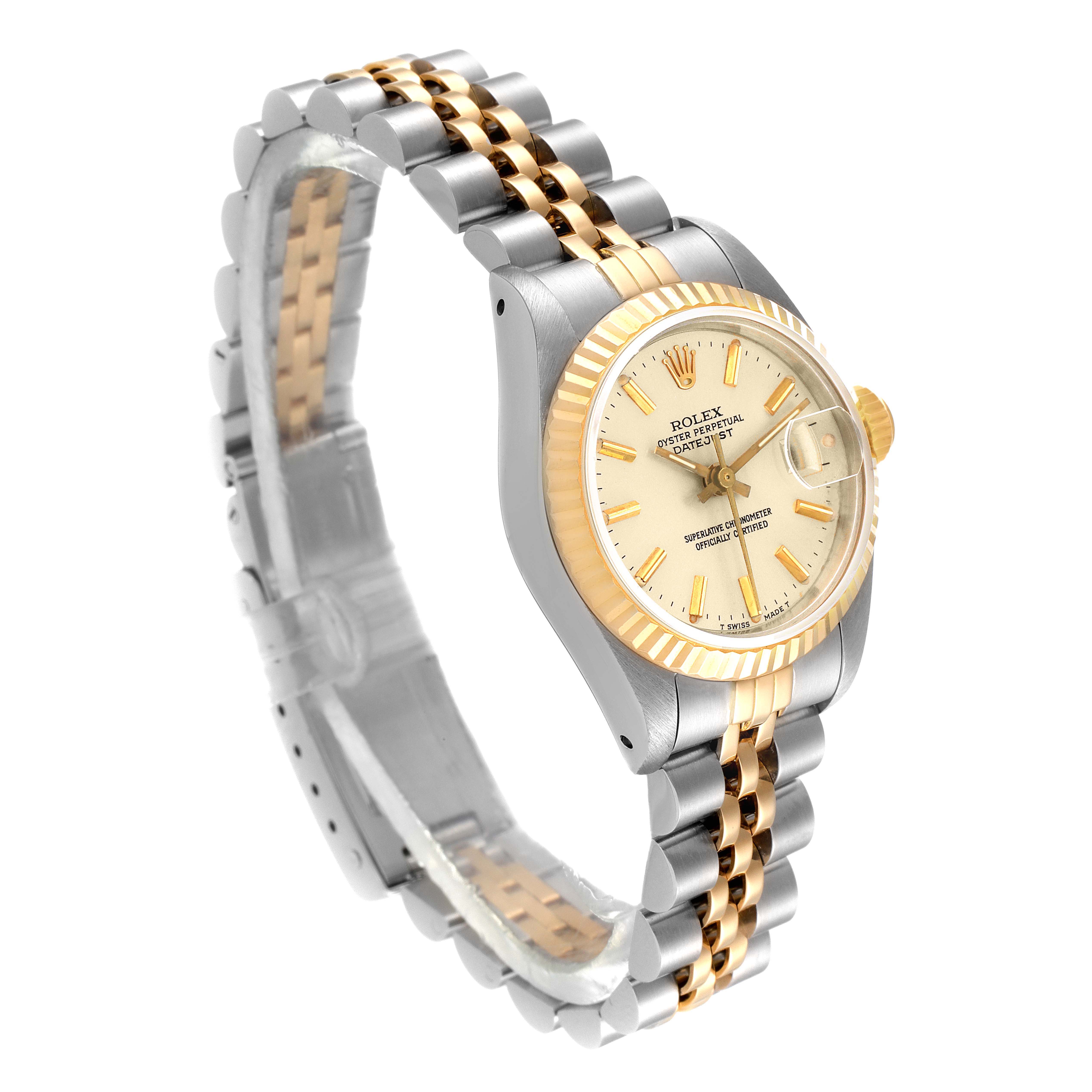 The image shows a Rolex Datejust 69173 Women
s Steel and Gold (two tone) Silver Dial 69173 Women
s Steel and Gold (two tone) Silver Dial watch at a three-quarter view angle, featuring its two-tone bracelet and fluted bezel.