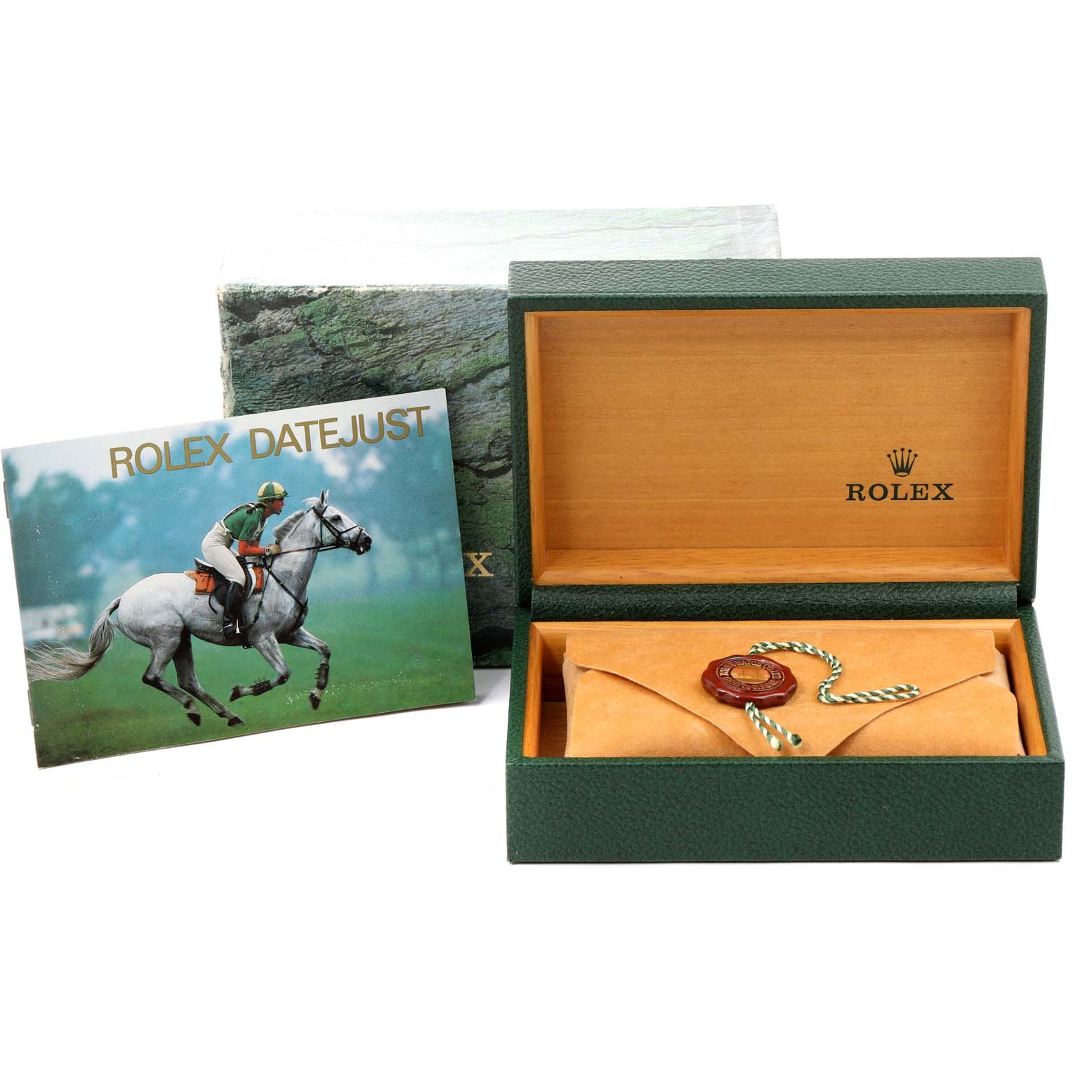 This image shows the packaging, a booklet, and an envelope for a Rolex Datejust 16233 Men's Steel and Gold (two tone) Blue Dial 16233 Men's Steel and Gold (two tone) Blue Dial watch.