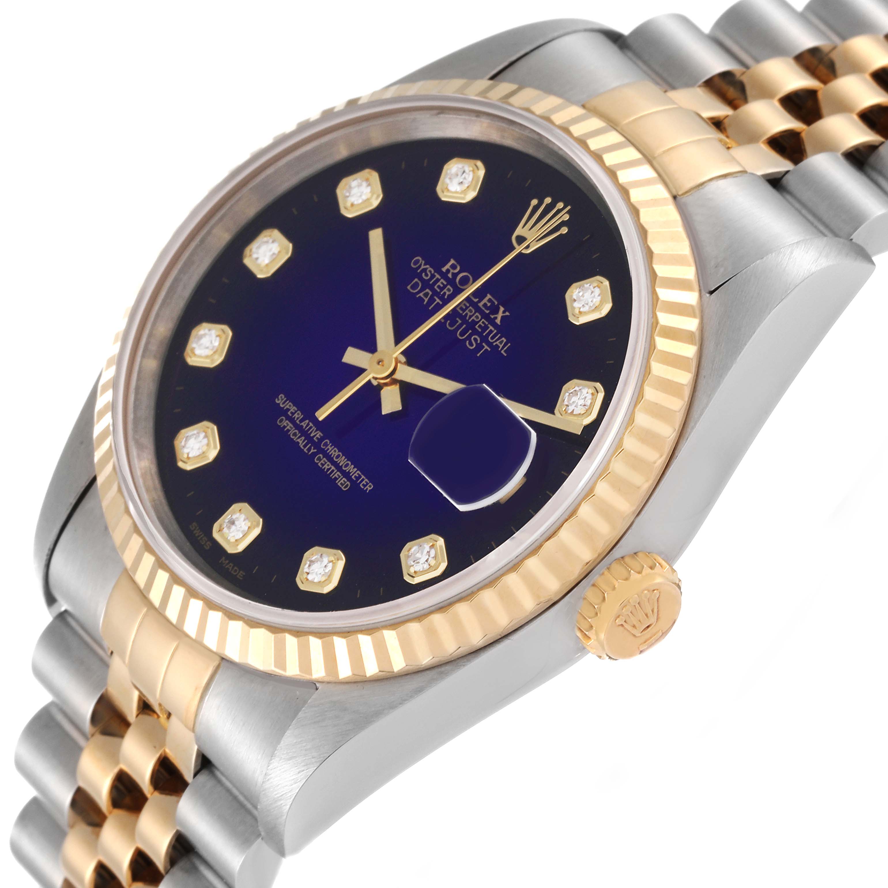 The image shows a close-up, angled view of a Rolex Datejust 16233 Men's Steel and Gold (two tone) Purple Dial 16233 Men's Steel and Gold (two tone) Purple Dial watch featuring its dial, fluted bezel, and crown.
