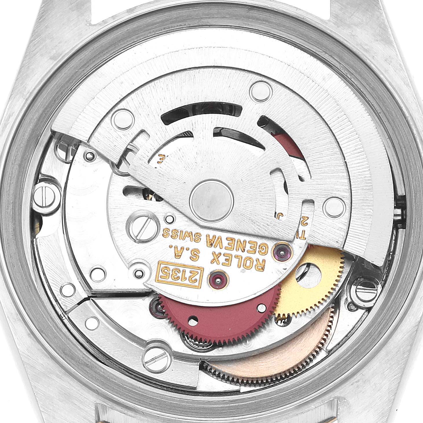 The image shows the movement of a Rolex Datejust 69173 Women's Steel and Gold (two tone) White Dial watch from a top-down angle, revealing gears and mechanics.