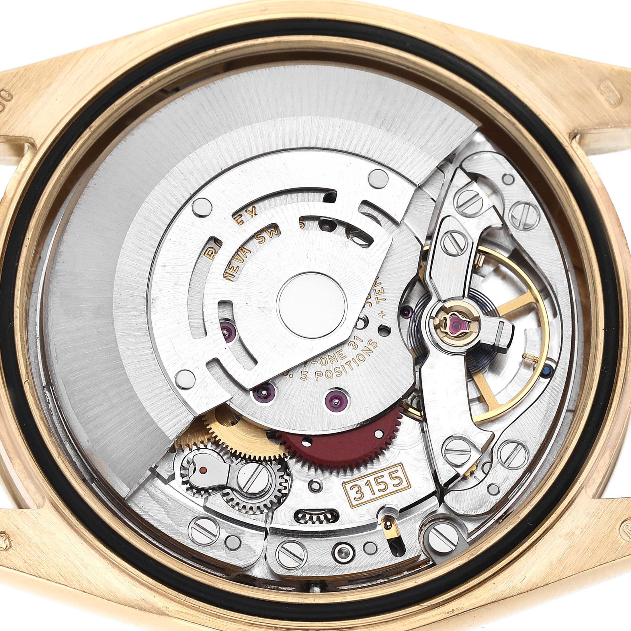 The image shows the internal mechanism of a Rolex President 118348 Men's Yellow Gold Champagne Dial 118348 Men's Yellow Gold Champagne Dial watch from the back, highlighting its movement and components.