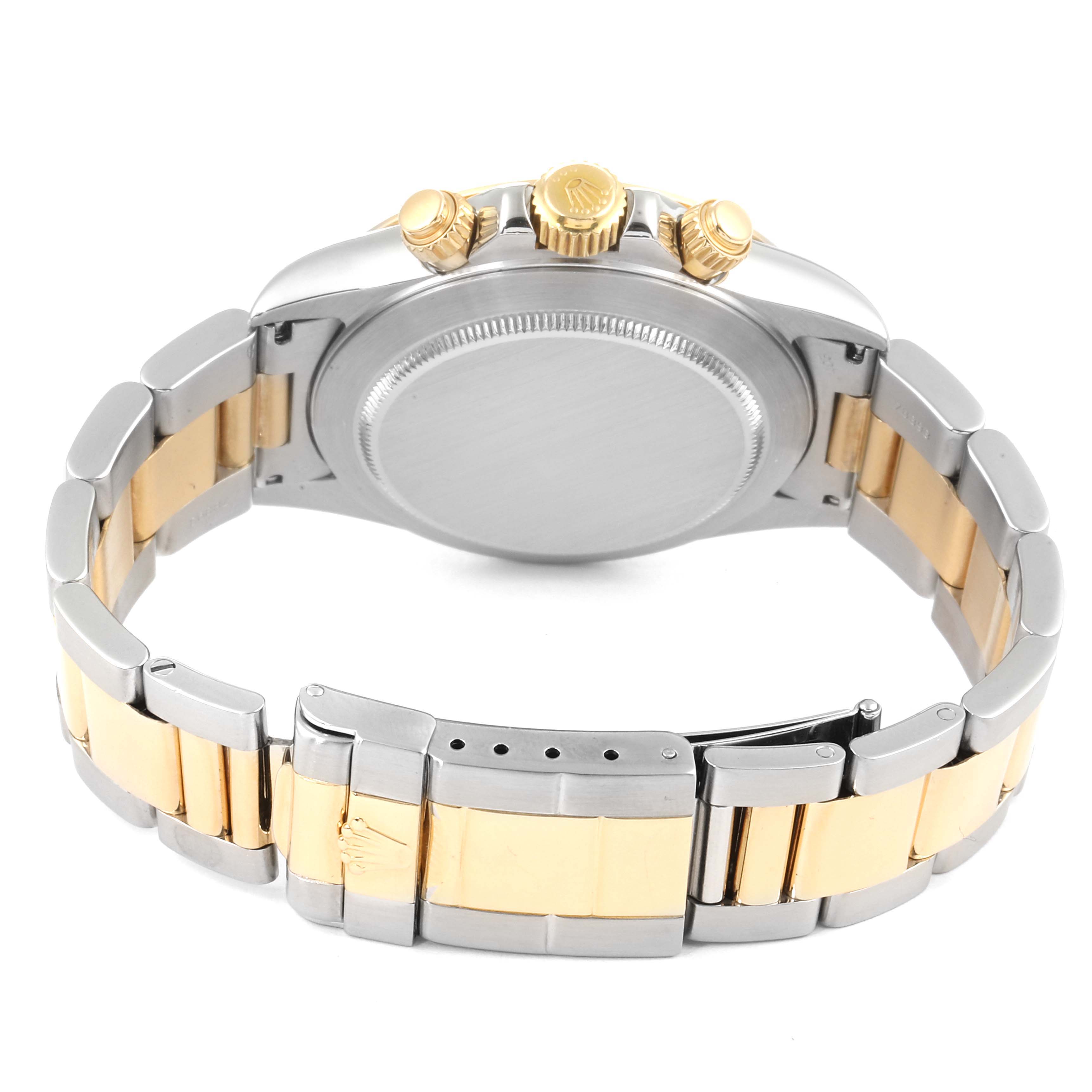 This image shows the back view of a Rolex Daytona 16523 Men's Steel and Gold (two tone) White Dial 16523 Men's Steel and Gold (two tone) White Dial watch, highlighting the clasp, bracelet, case back, and crown.
