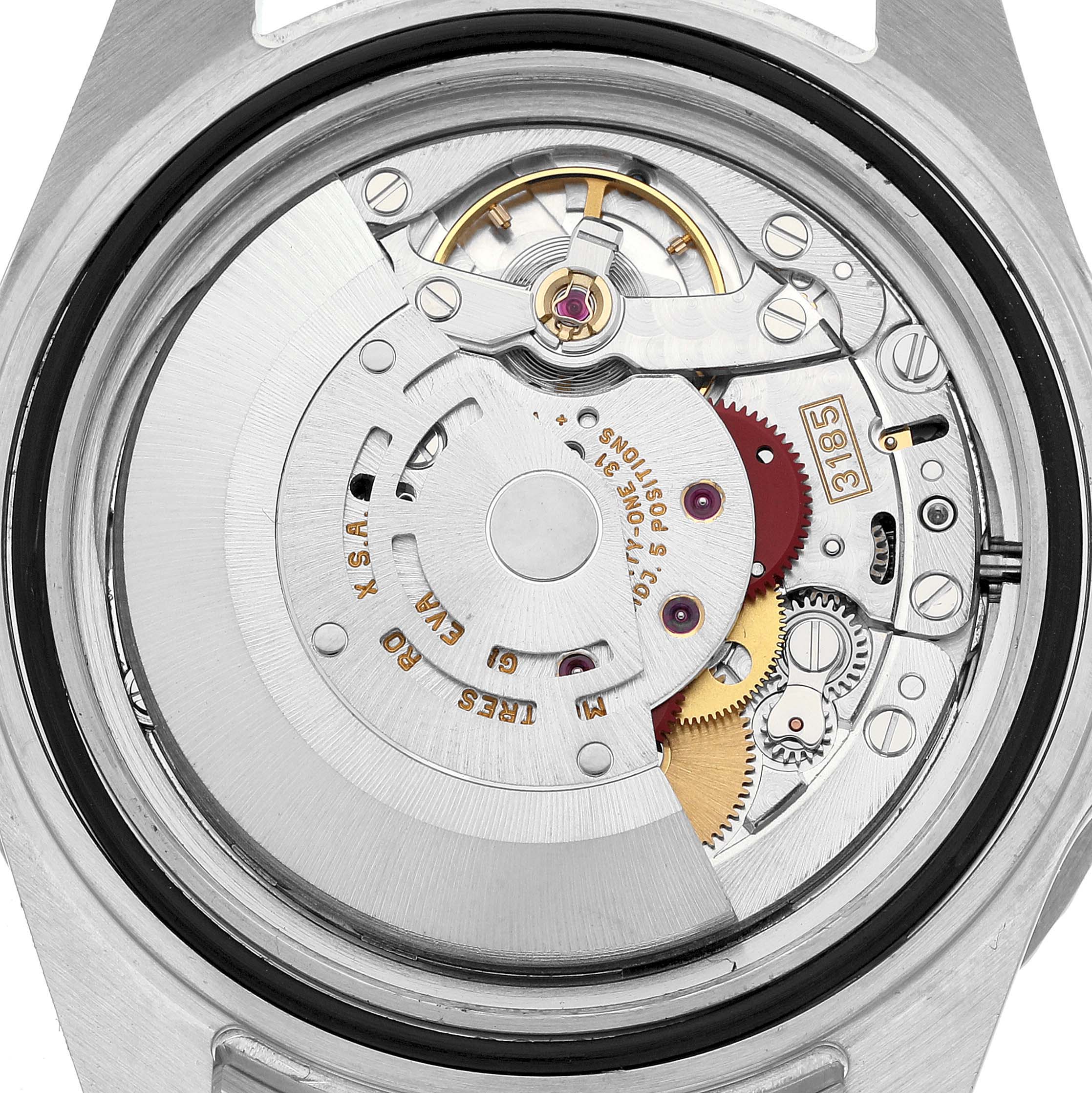 The image shows the movement mechanism of a Rolex GMT-Master 16710 Men's Stainless Steel Black Dial watch from the back, highlighting gears and the rotor.