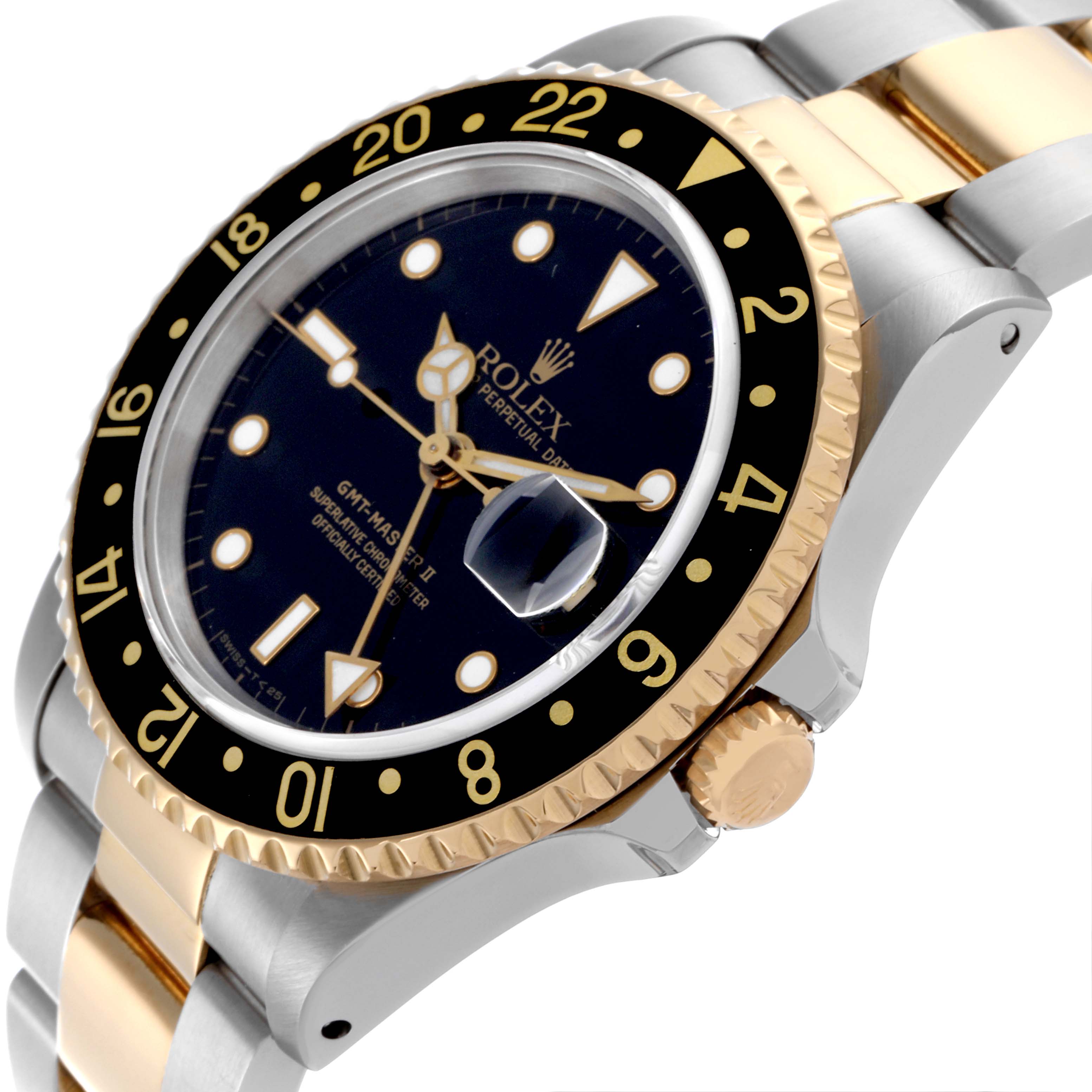 The image shows the Rolex GMT-Master 16713 Men's Steel and Gold (two tone) Black Dial 16713 Men's Steel and Gold (two tone) Black Dial model at an angled side view, highlighting the bezel, dial, crown, and bracelet.