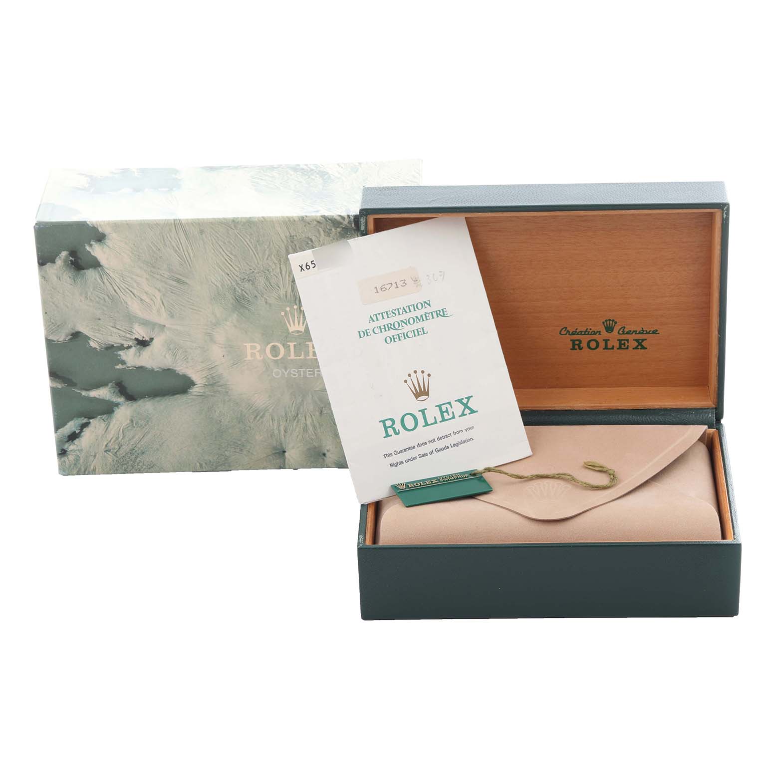 The image shows a Rolex GMT-Master 16713 Men's Steel and Gold (two tone) Black Dial 16713 Men's Steel and Gold (two tone) Black Dial box with paperwork and a pouch inside, viewed from the front.