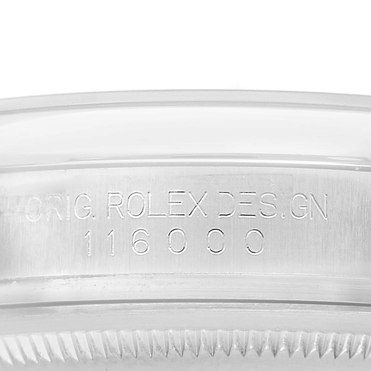 The image shows the side of a Rolex Oyster Perpetual 116000 Men's Stainless Steel Blue Dial watch with engraved text on the case, including the design number.