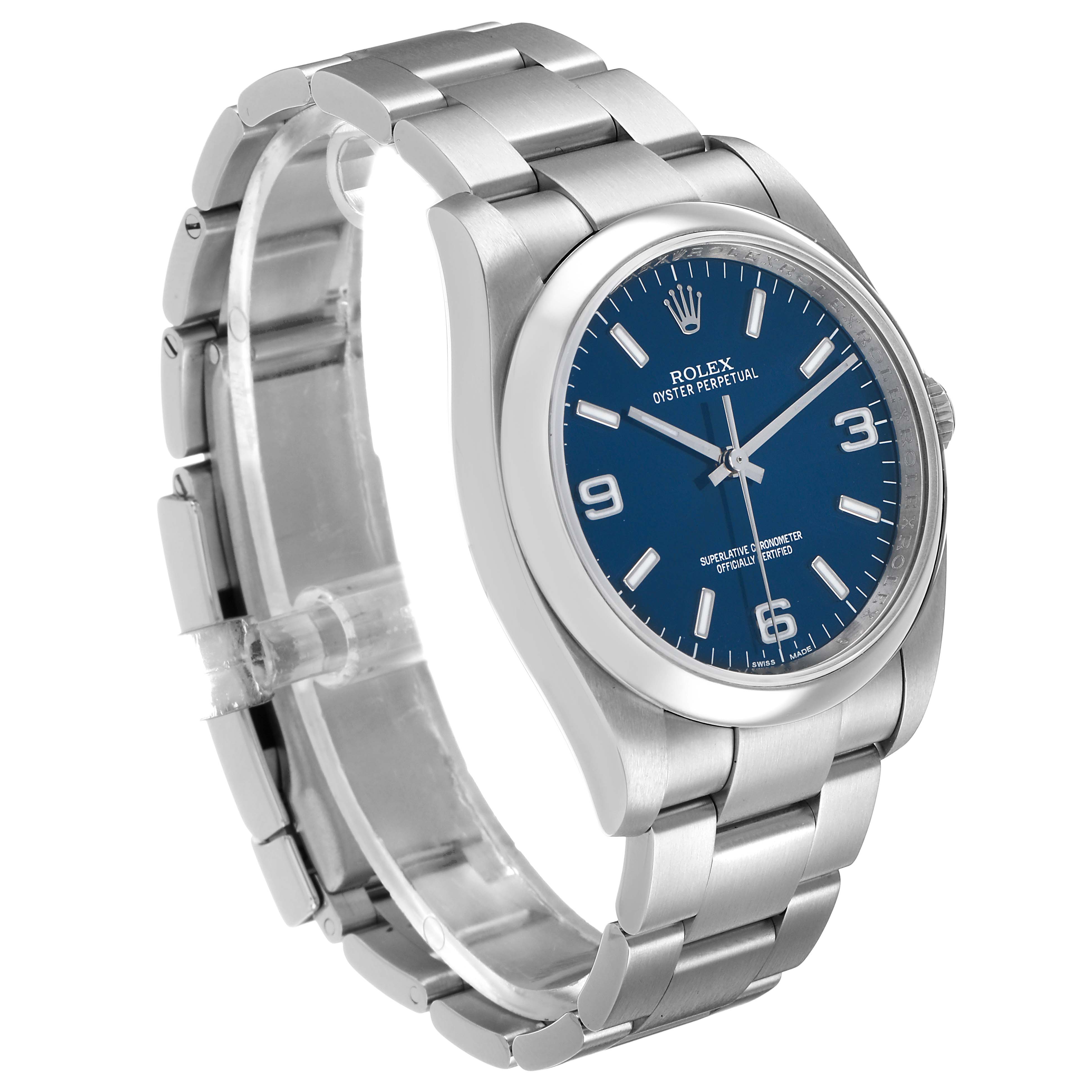 The Rolex Oyster Perpetual 116000 Men's Stainless Steel Blue Dial watch is shown at a three-quarter angle, displaying the face, bezel, and bracelet.