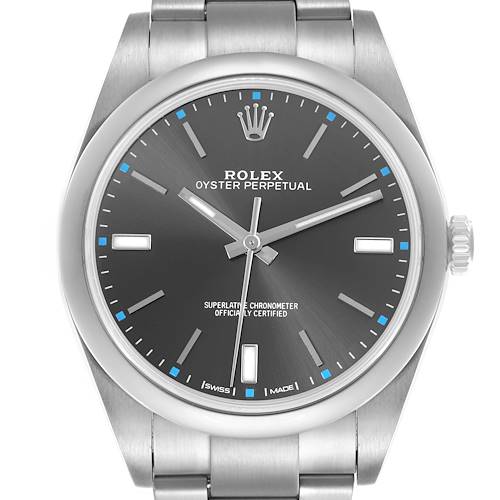 The image shows a front view of the Rolex Oyster Perpetual watch, highlighting the dial, bezel, and part of the bracelet.