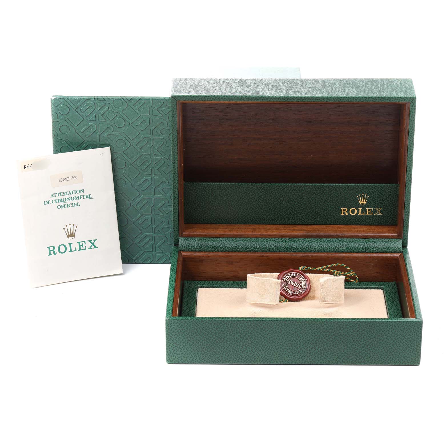 The image displays the open box for a Rolex President 68278 Women
s Yellow Gold Champagne Dial 68278 Women
s Yellow Gold Champagne Dial model watch along with its booklet and hang tag.