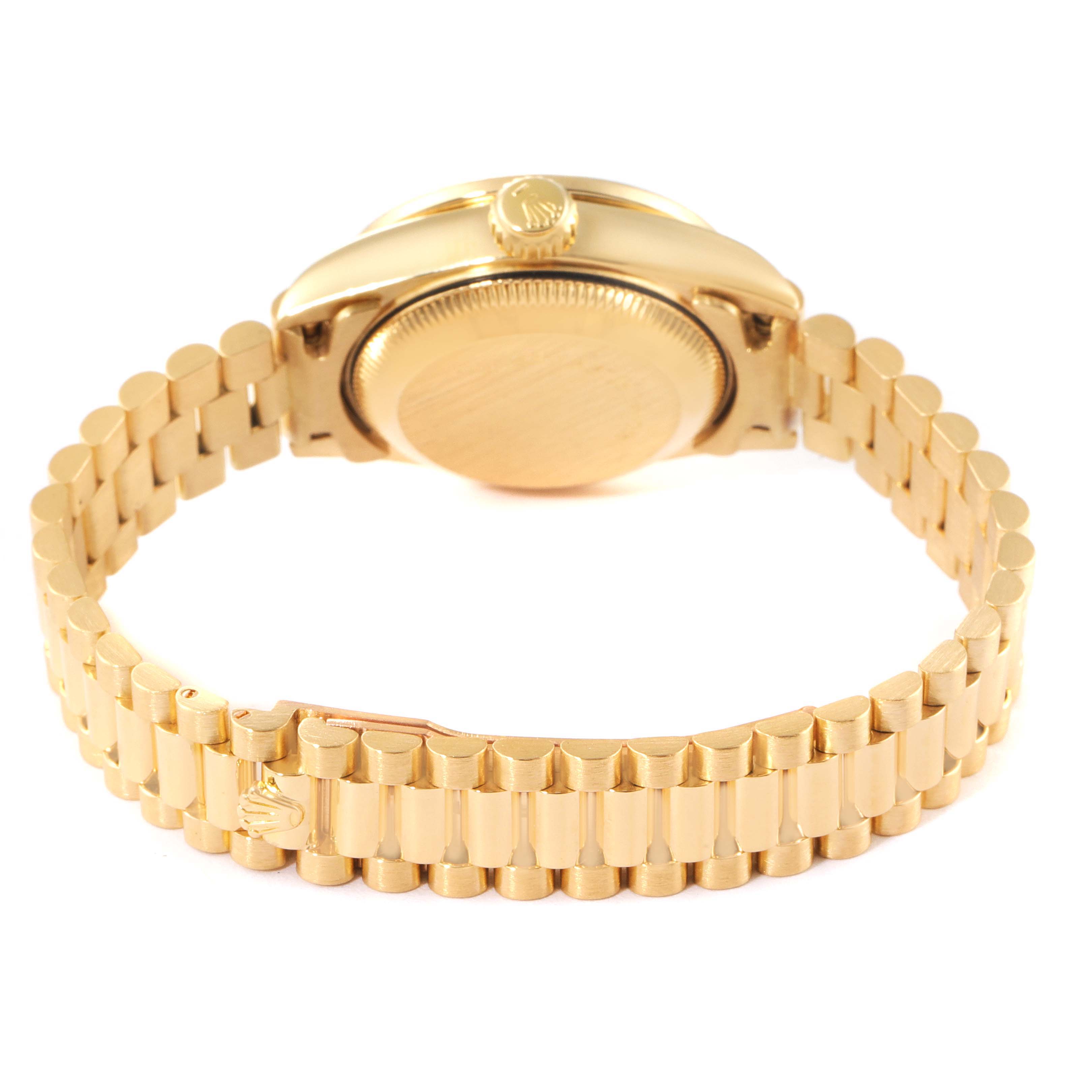 This image shows the backside and bracelet of a Rolex President 69068 Women
s Yellow Gold Champagne Dial 69068 Women
s Yellow Gold Champagne Dial model watch, focusing on the case back and the gold link bracelet.
