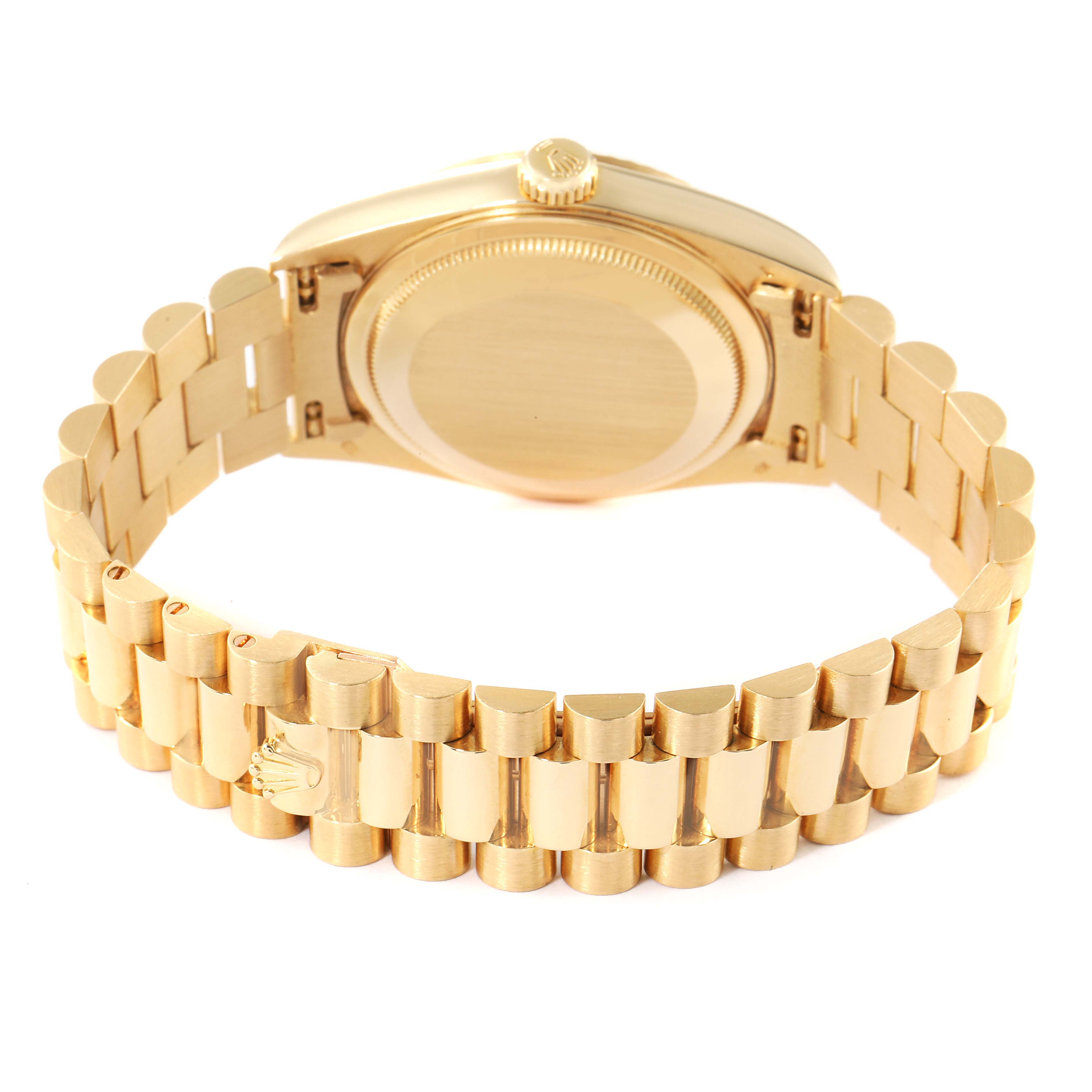This image shows the back view of a Rolex President 18238 Men's Yellow Gold Champagne Dial 18238 Men's Yellow Gold Champagne Dial model watch, highlighting the case back and bracelet.