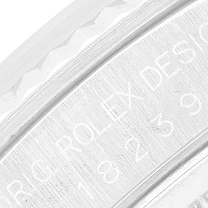 The image shows a close-up of the bezel and edge of the dial on a Rolex President 18239 Men's White Gold Silver Dial 18239 Men's White Gold Silver Dial model watch, highlighting the engravings.