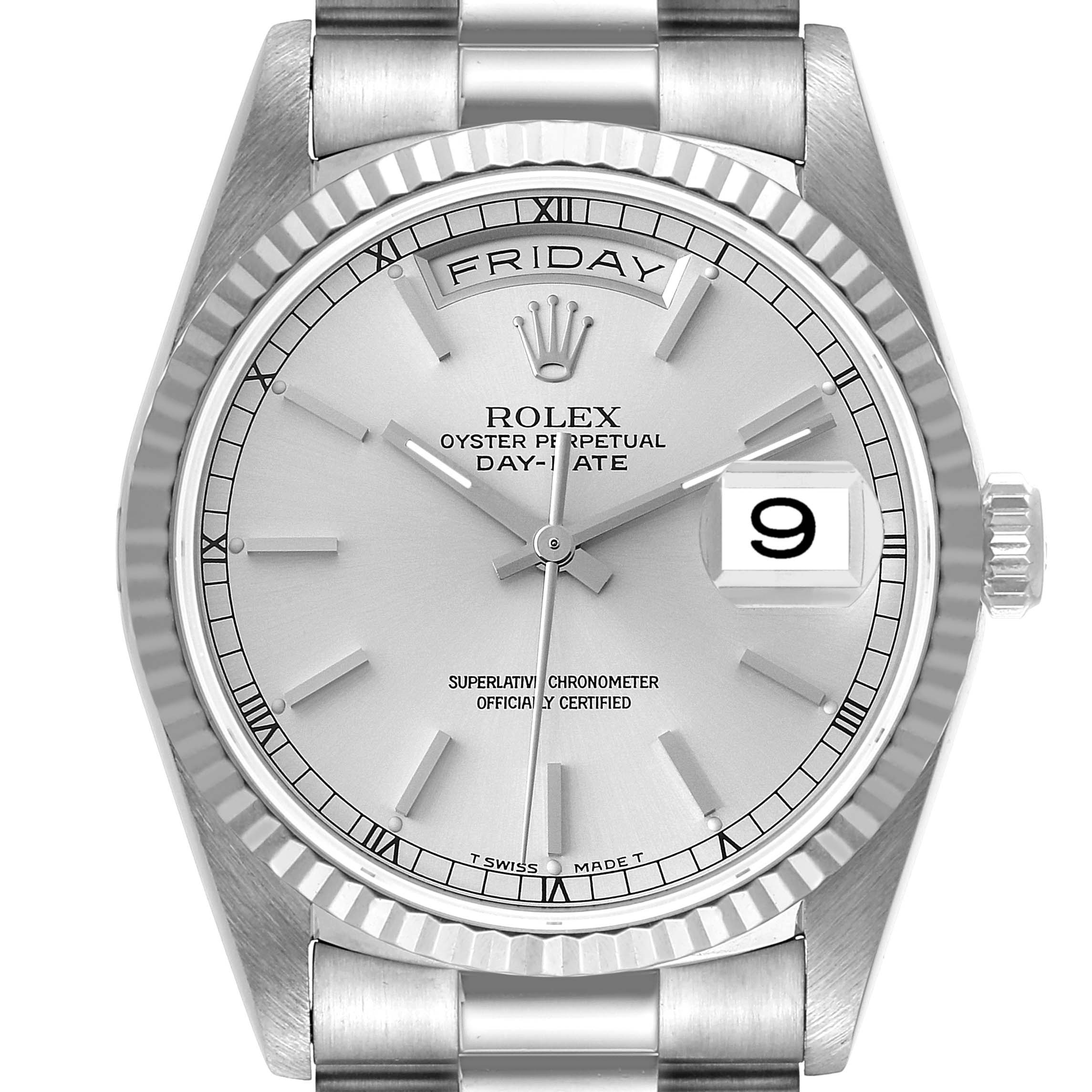 This image shows a close-up of the Rolex President 18239 Men's White Gold Silver Dial 18239 Men's White Gold Silver Dial Day-Date watch, displaying the dial, hands, bezel, day, and date magnifier.