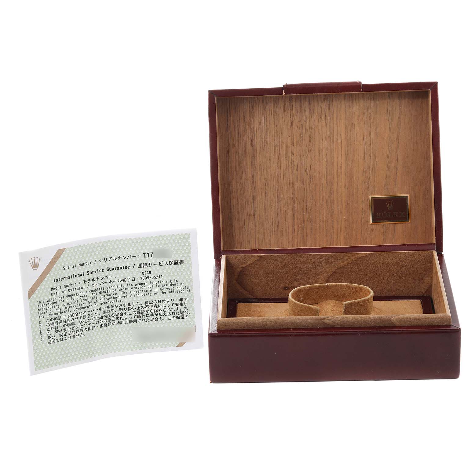 This image shows the open box and warranty card for a Rolex President 18239 Men's White Gold Silver Dial 18239 Men's White Gold Silver Dial watch.