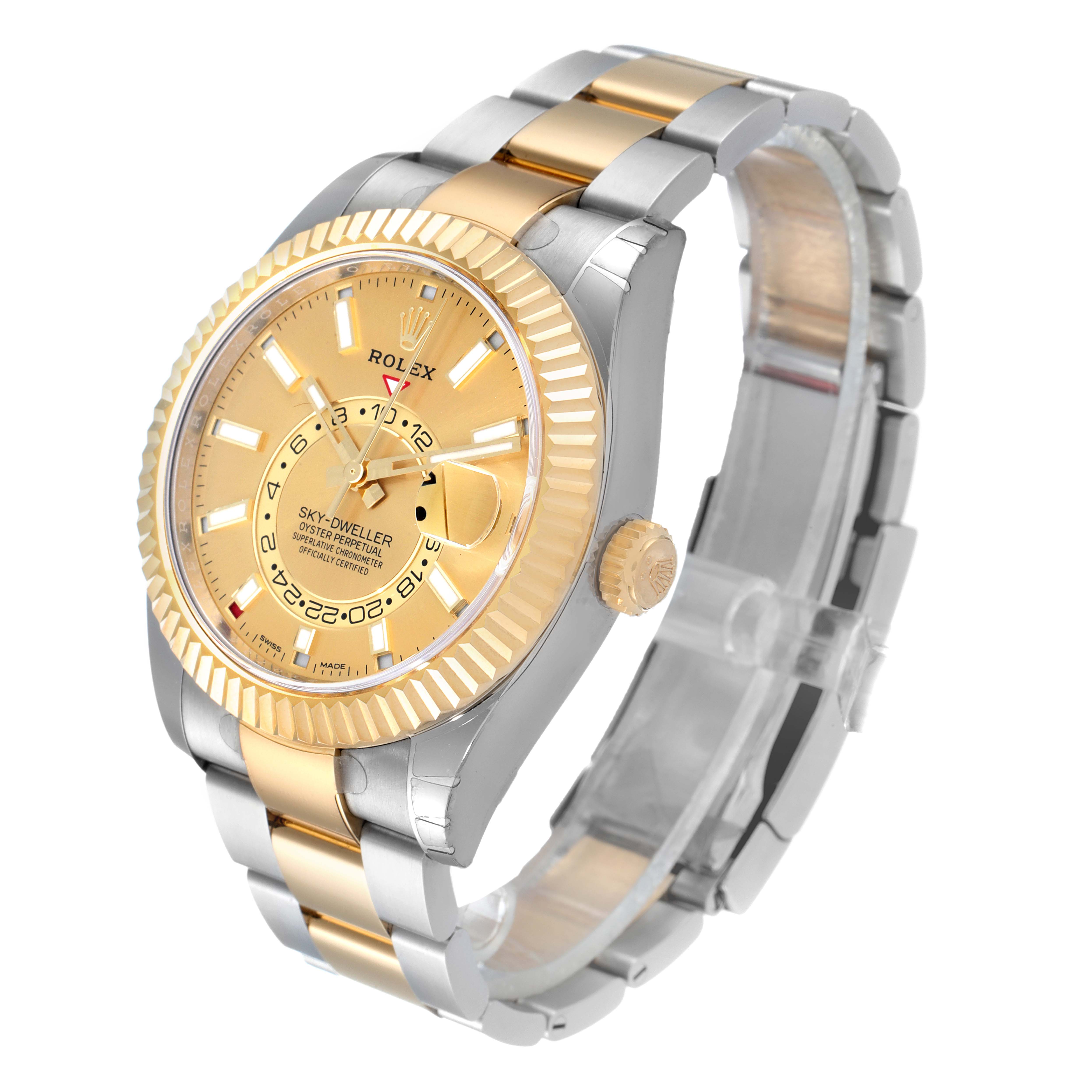 The Rolex Sky-Dweller 326933 Men's Yellow Gold Champagne Dial 326933 Men's Yellow Gold Champagne Dial watch is shown at a slightly tilted angle, highlighting the face, bezel, dial, and bracelet.