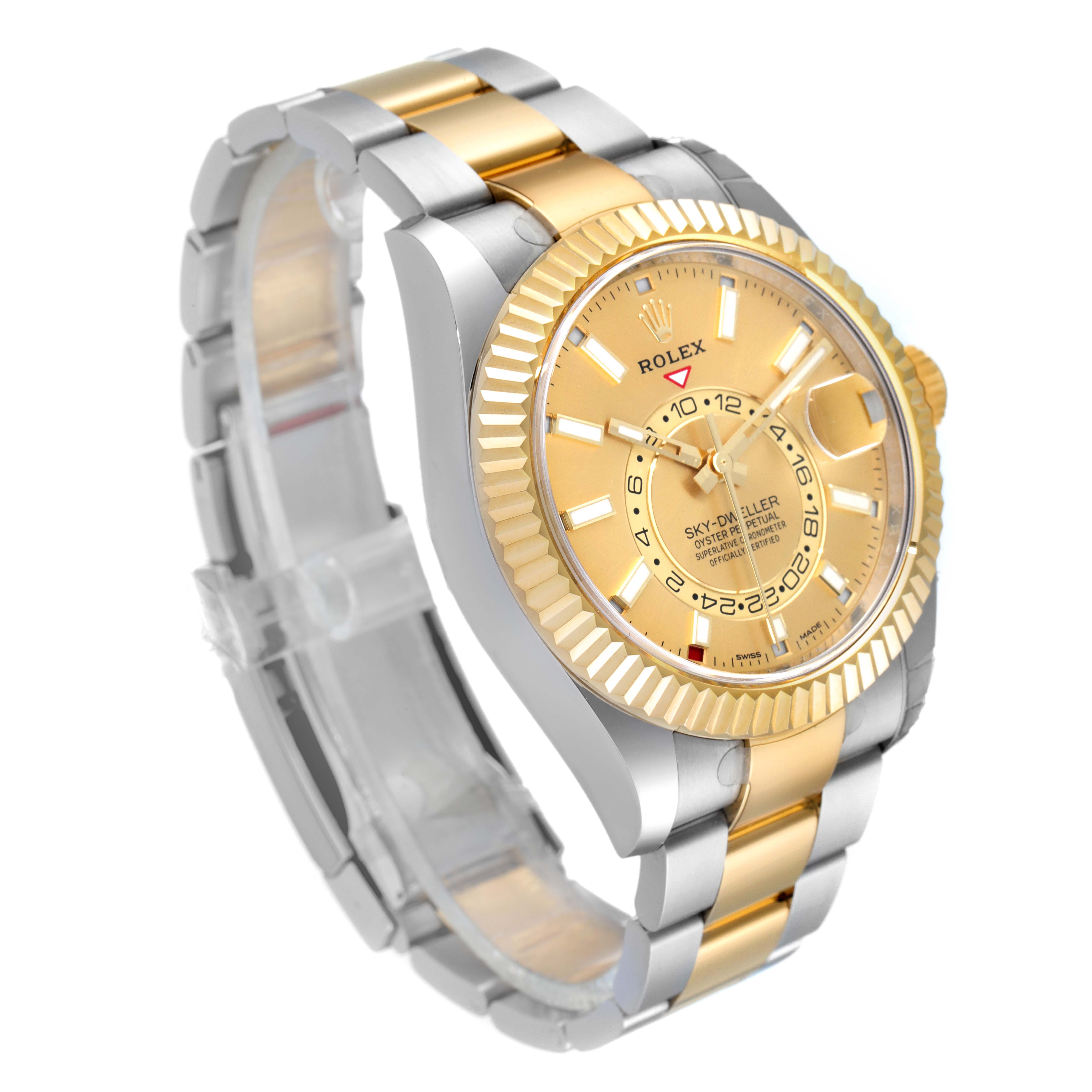 The Rolex Sky-Dweller 326933 Men's Yellow Gold Champagne Dial 326933 Men's Yellow Gold Champagne Dial watch is shown at a three-quarter angle, highlighting the gold and stainless steel bracelet, bezel, and dial.