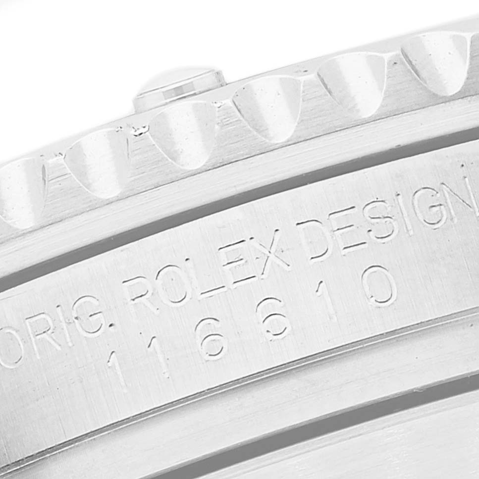 This image shows a close-up of the engraved bezel and case of a Rolex Submariner 116610 Men's Stainless Steel Black Dial 116610 Men's Stainless Steel Black Dial watch.