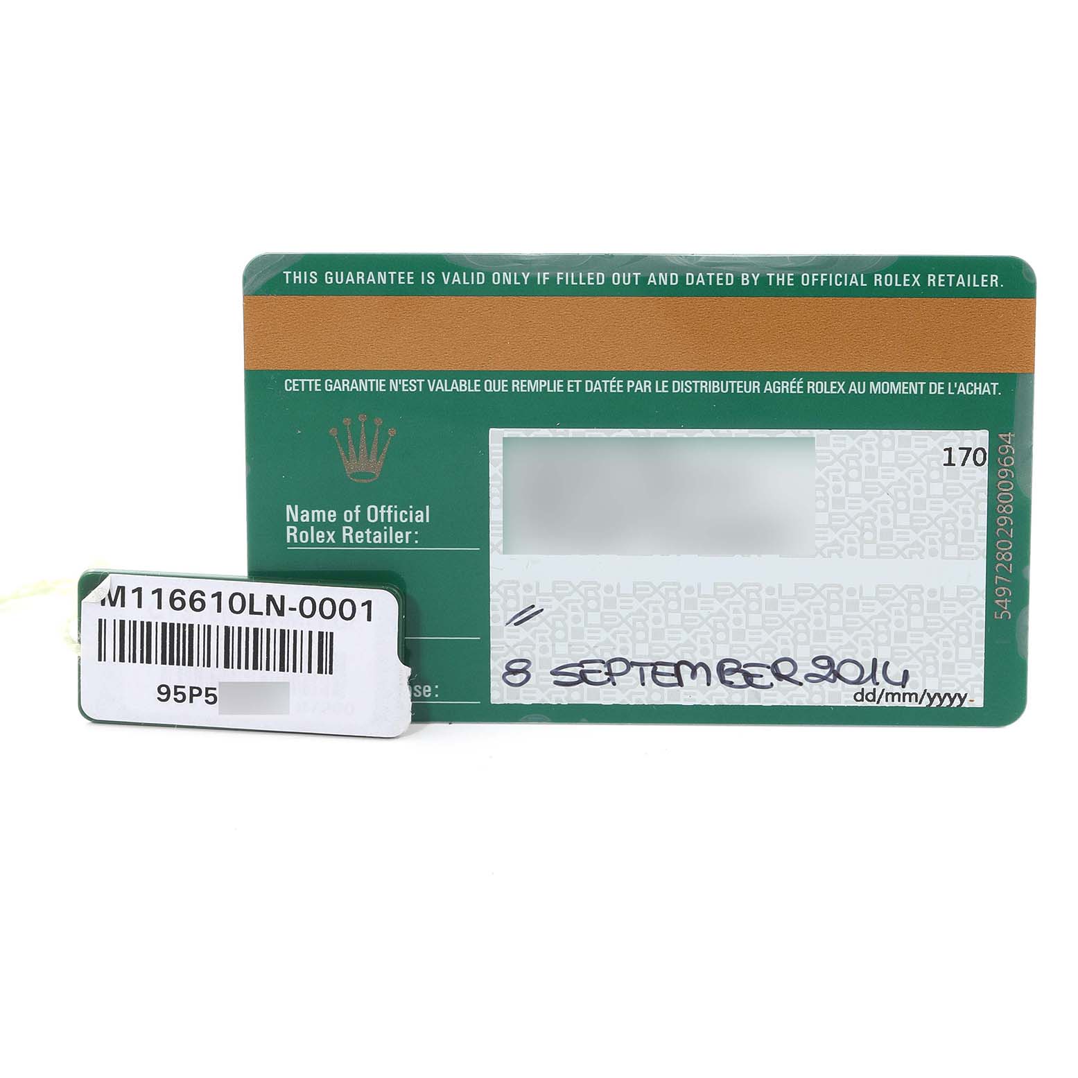 Close-up of a guarantee card and tag for a Rolex Submariner 116610 Men's Stainless Steel Black Dial 116610 Men's Stainless Steel Black Dial watch, showing model number, date, and retailer information.