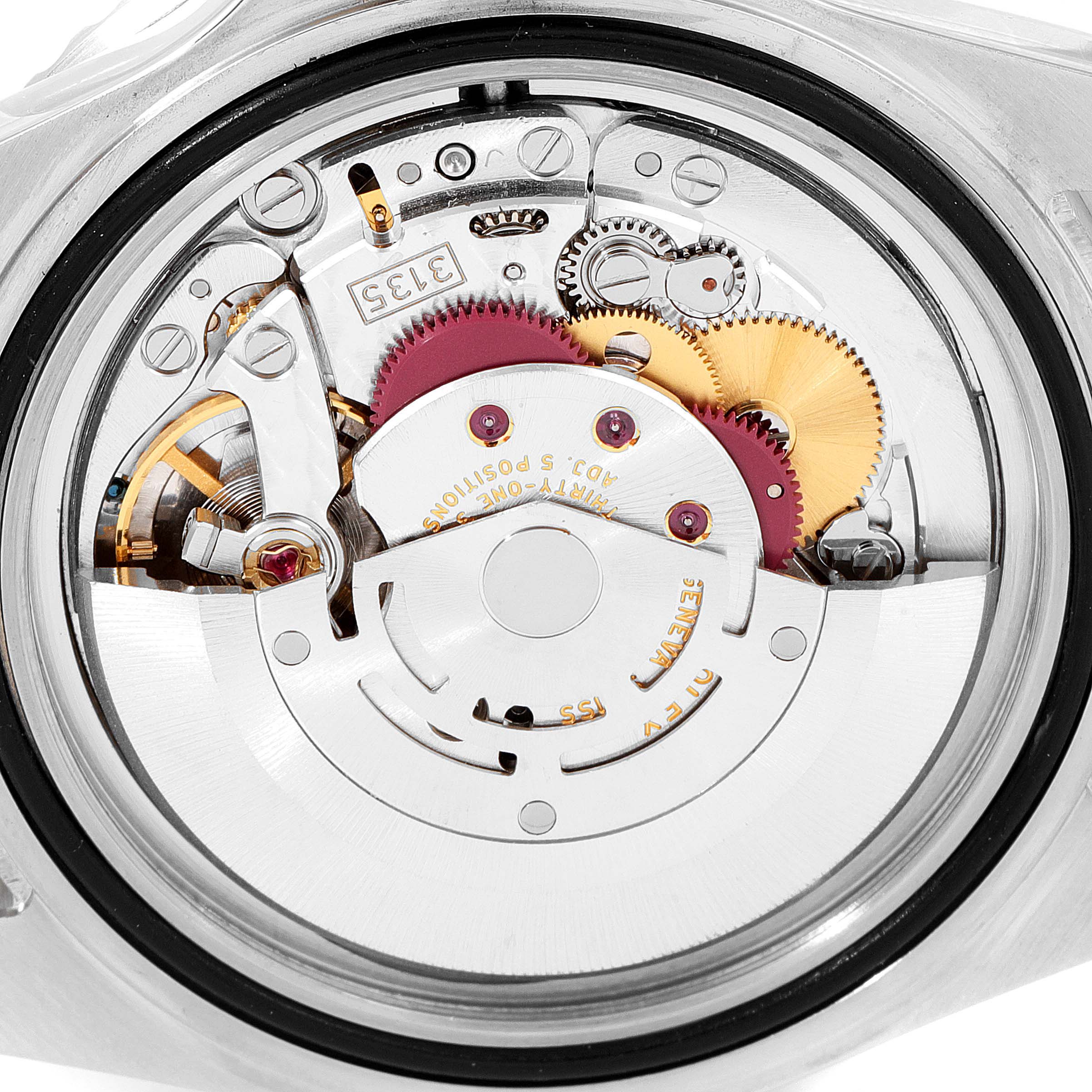 This image shows the internal mechanism, or movement, of a Rolex Submariner 16610 Men
s Stainless Steel Black Dial 16610 Men
s Stainless Steel Black Dial watch viewed from the back.