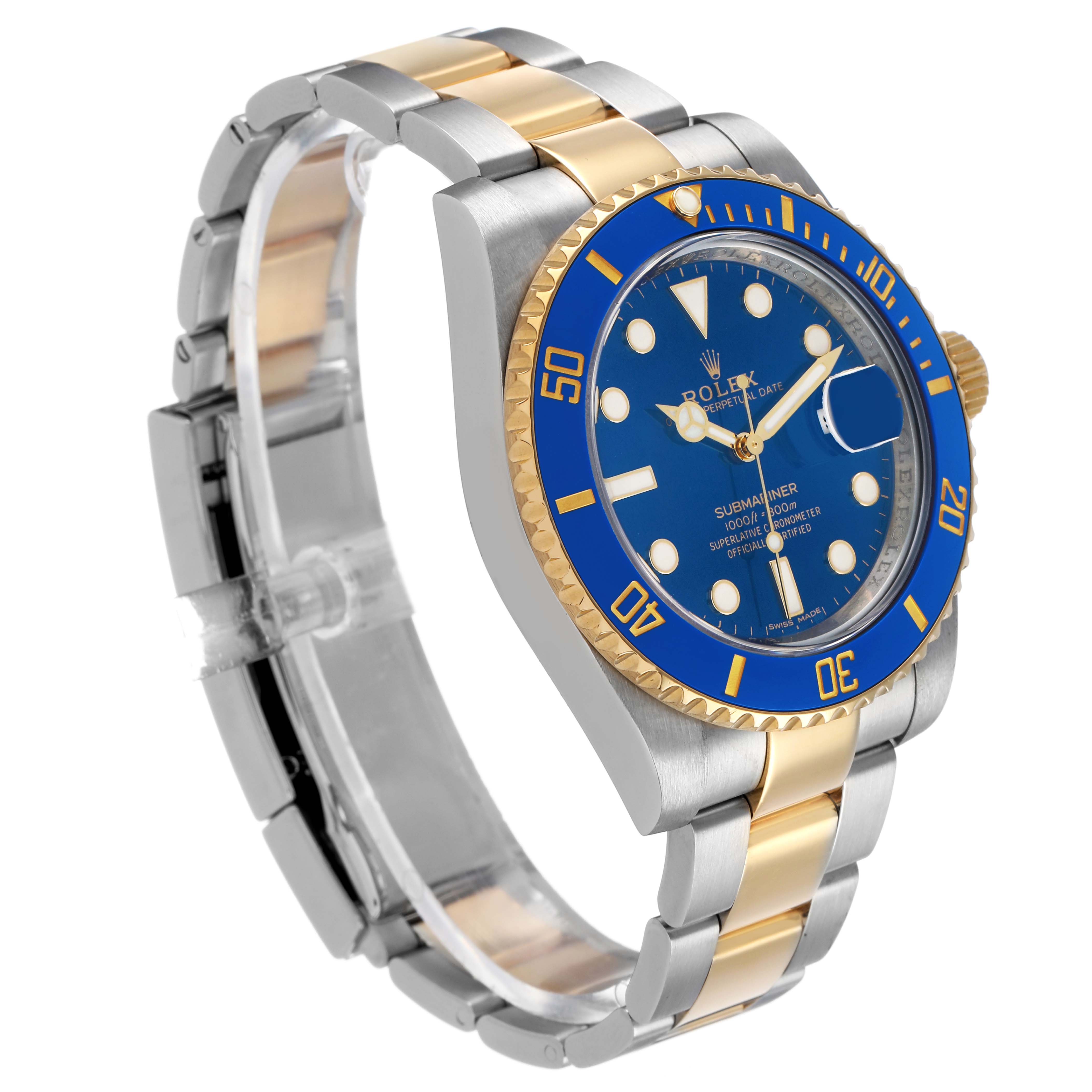 The Rolex Submariner 116613 Men's Steel and Gold (two tone) Blue Dial is shown at an angled perspective, highlighting the blue and gold bezel, dial, and two-tone bracelet.