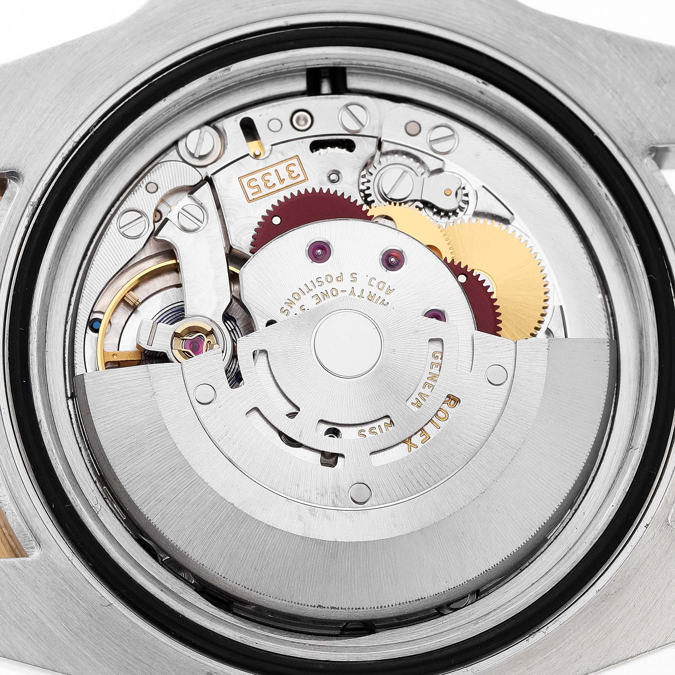 The image shows the movement mechanism of a Rolex Submariner 116613 Men's Steel and Gold (two tone) Blue Dial from a top-down angle, highlighting gears and the rotor.