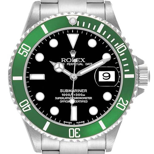 The image shows a Rolex Submariner watch from a front angle, featuring a green bezel and a black dial.