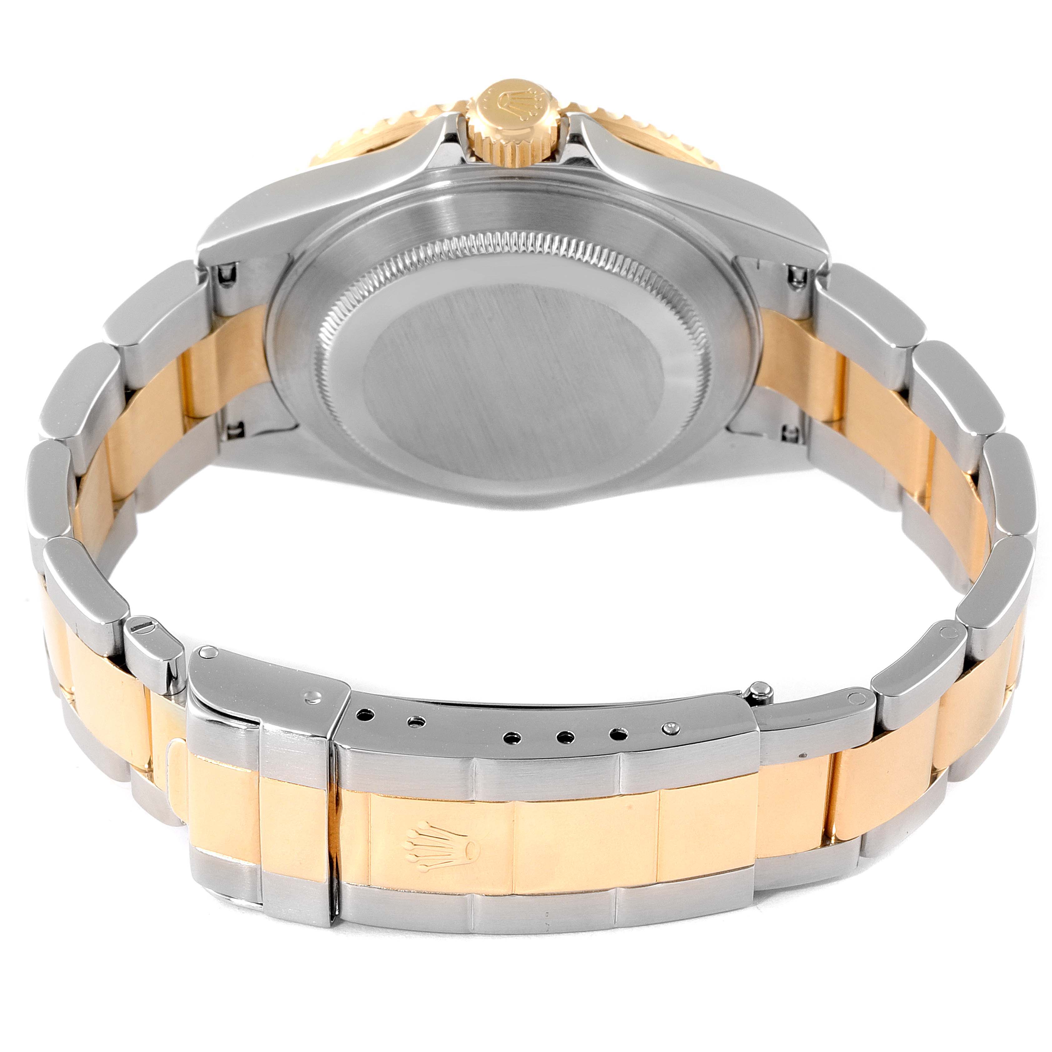 The image shows the back view of a Rolex Submariner 16613 Men's Steel and Gold (two tone) Champagne Dial 16613 Men's Steel and Gold (two tone) Champagne Dial watch, highlighting its case back, bracelet, and clasp.