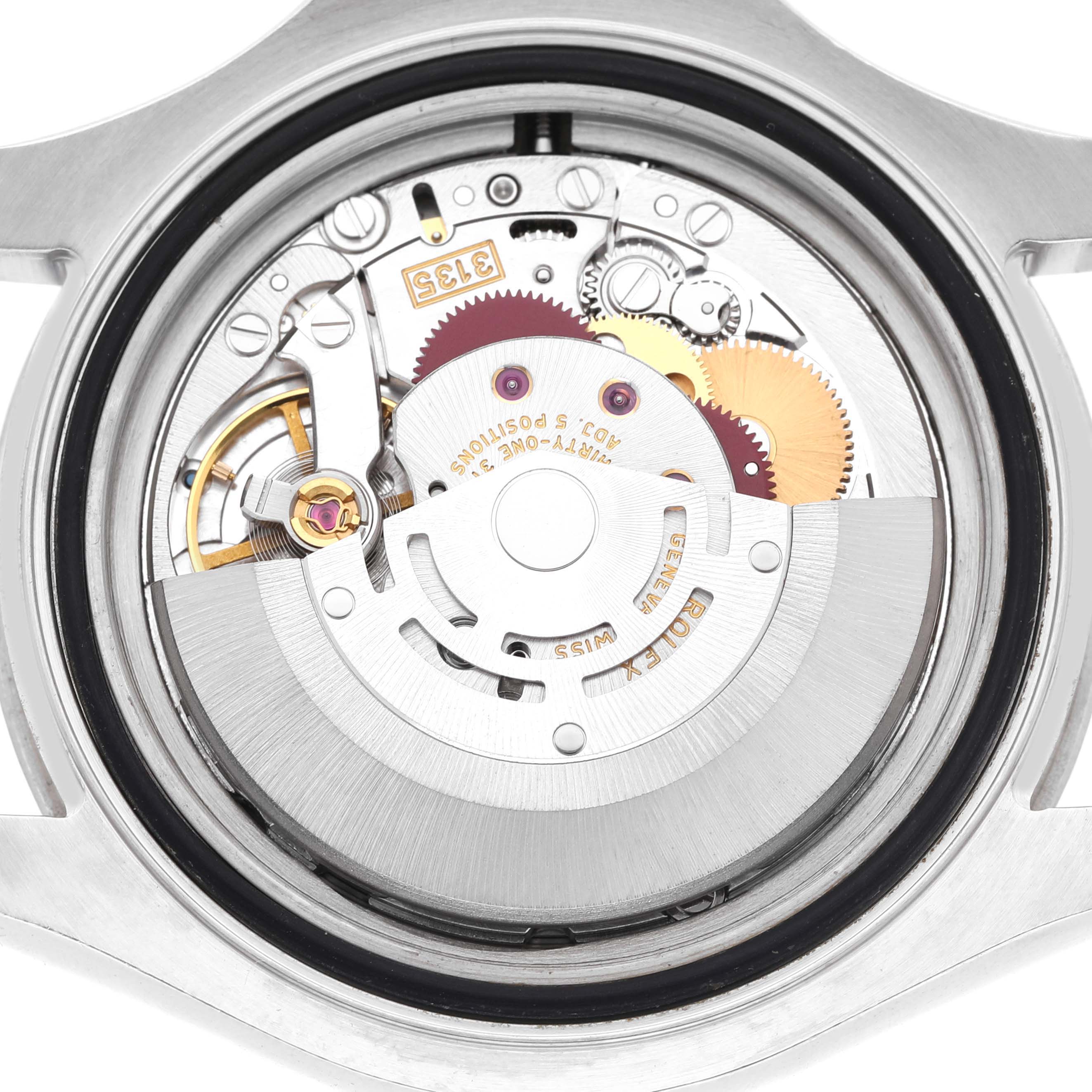 The image shows the open case back of a Rolex Yacht-Master 16622 Men's Stainless Steel Silver Dial watch, revealing the intricate movement inside.
