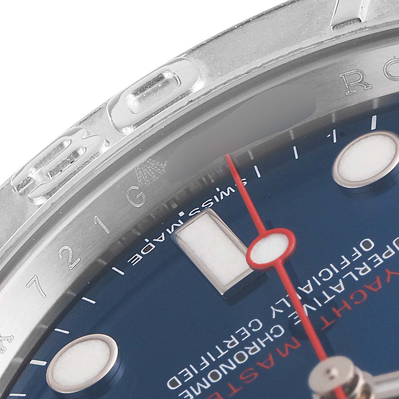 This image shows a close-up of the Rolex Yacht-Master 116622 Men
s Stainless Steel Blue Dial 116622 Men
s Stainless Steel Blue Dial watch face, highlighting the bezel, dial, and part of the minute and second hands.