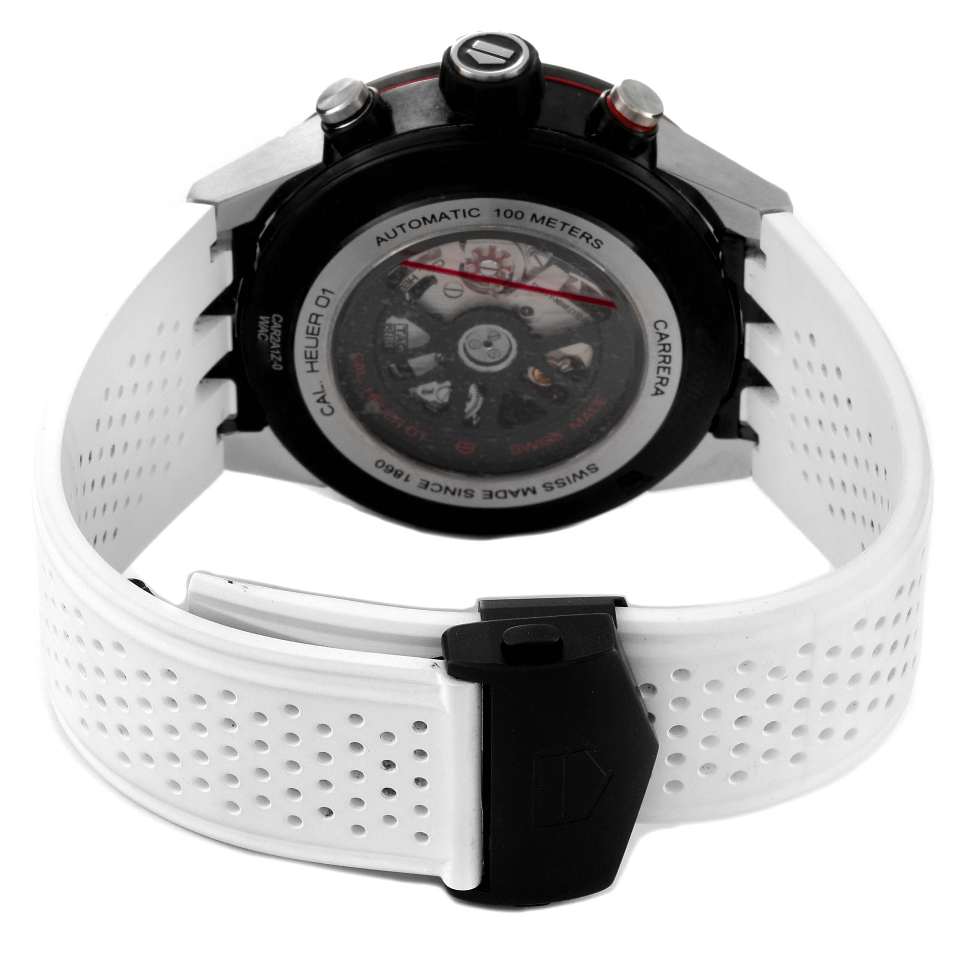 The image shows the back view of a Tag Heuer Carrera CAR2A1Z.FT6044 Men
s Stainless Steel Black Dial CAR2A1Z.FT6044 Men
s Stainless Steel Black Dial watch, highlighting its automatic movement and white perforated strap.