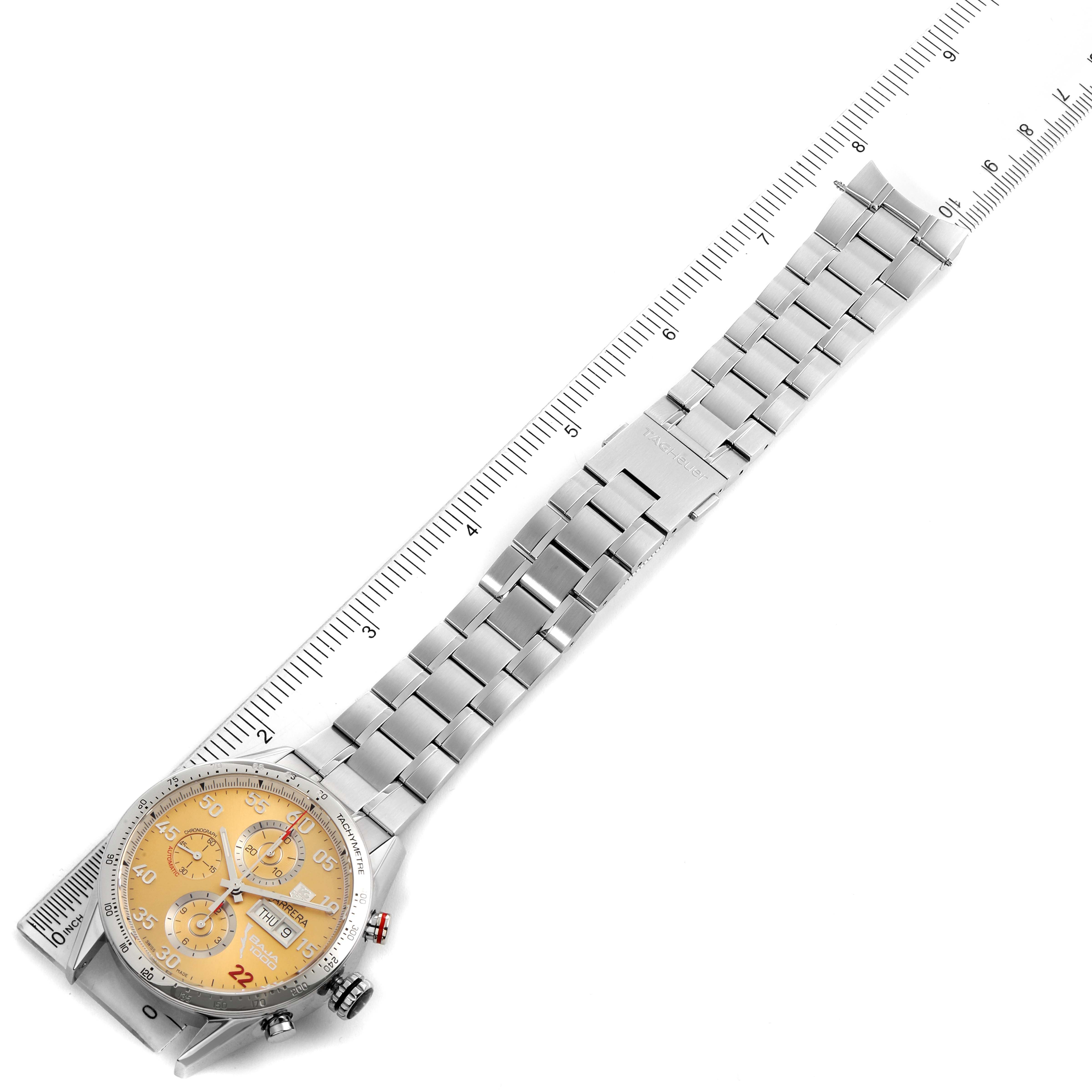 The image shows a Tag Heuer Carrera CV2A1H Men's Stainless Steel Champagne Dial CV2A1H Men's Stainless Steel Champagne Dial watch laid flat with its bracelet measured against a ruler.
