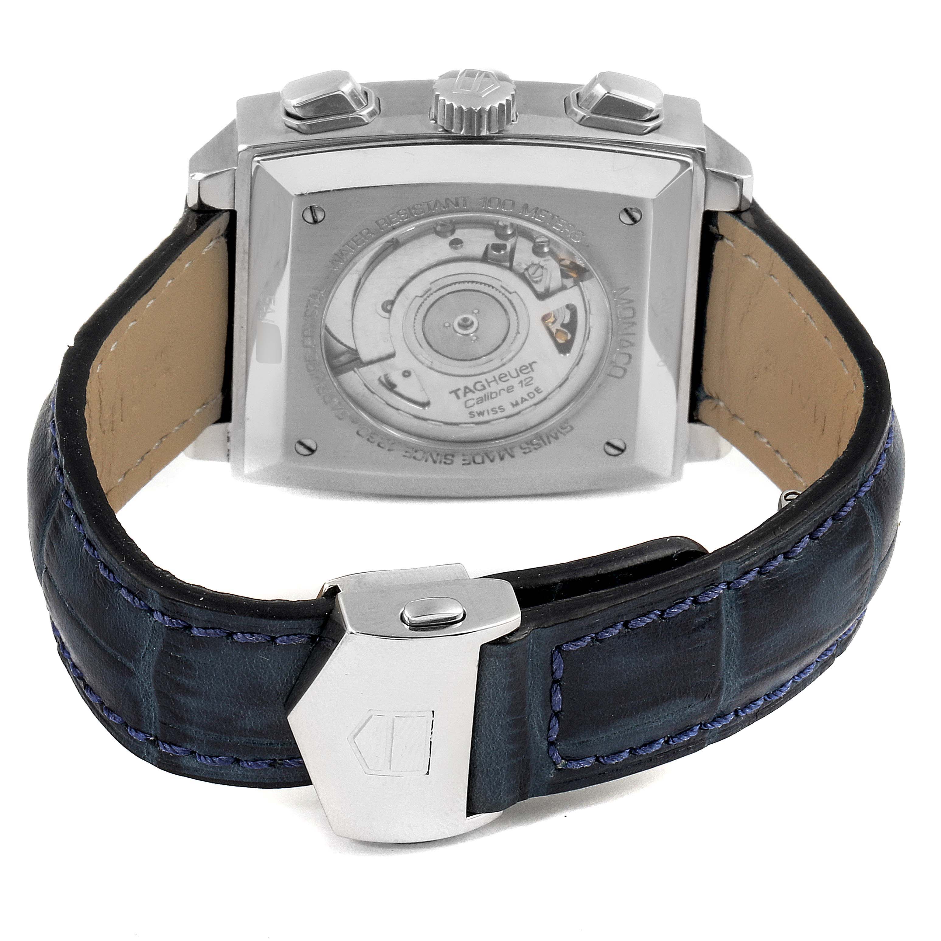 The image shows the back of a Tag Heuer Monaco CAW2111 Men's Stainless Steel Blue Dial CAW2111 Men's Stainless Steel Blue Dial watch, highlighting its movement and leather strap.
