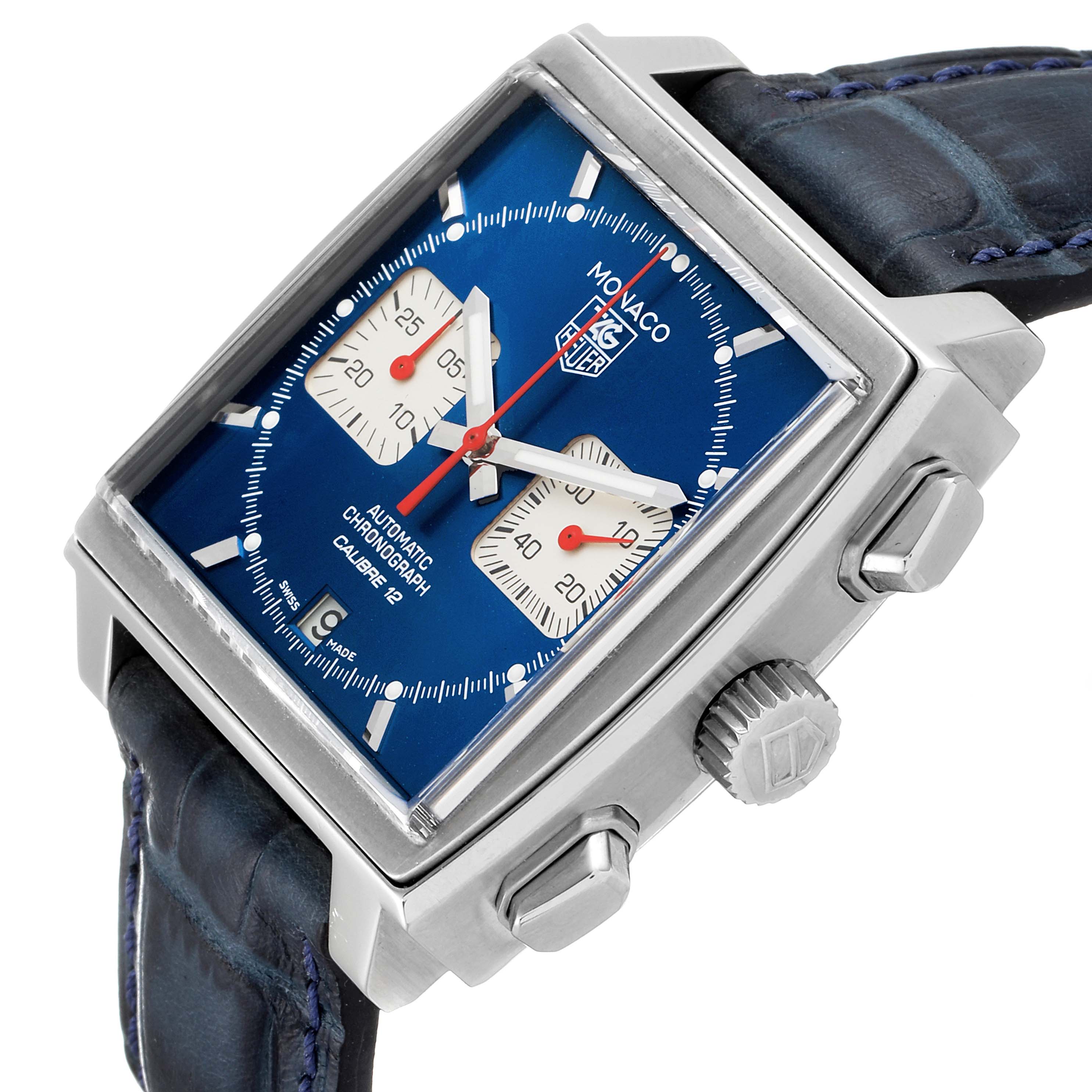 The image shows a close-up angled view of the Tag Heuer Monaco CAW2111 Men's Stainless Steel Blue Dial CAW2111 Men's Stainless Steel Blue Dial watch, highlighting its square blue dial, subdials, and crown.