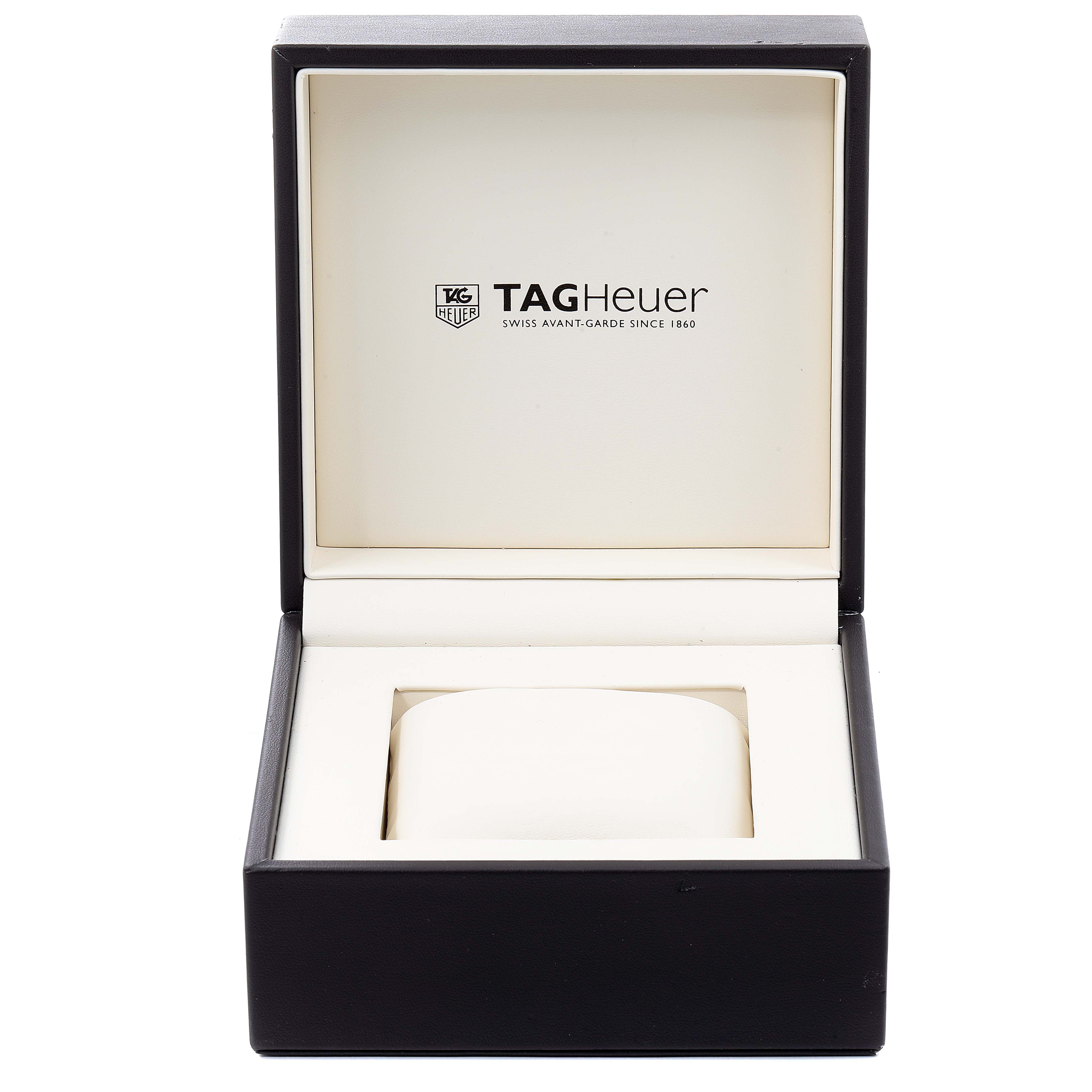The image shows an open Tag Heuer Monaco CAW2111 Men's Stainless Steel Blue Dial CAW2111 Men's Stainless Steel Blue Dial watch box, displaying the brand logo and cushioning inside.