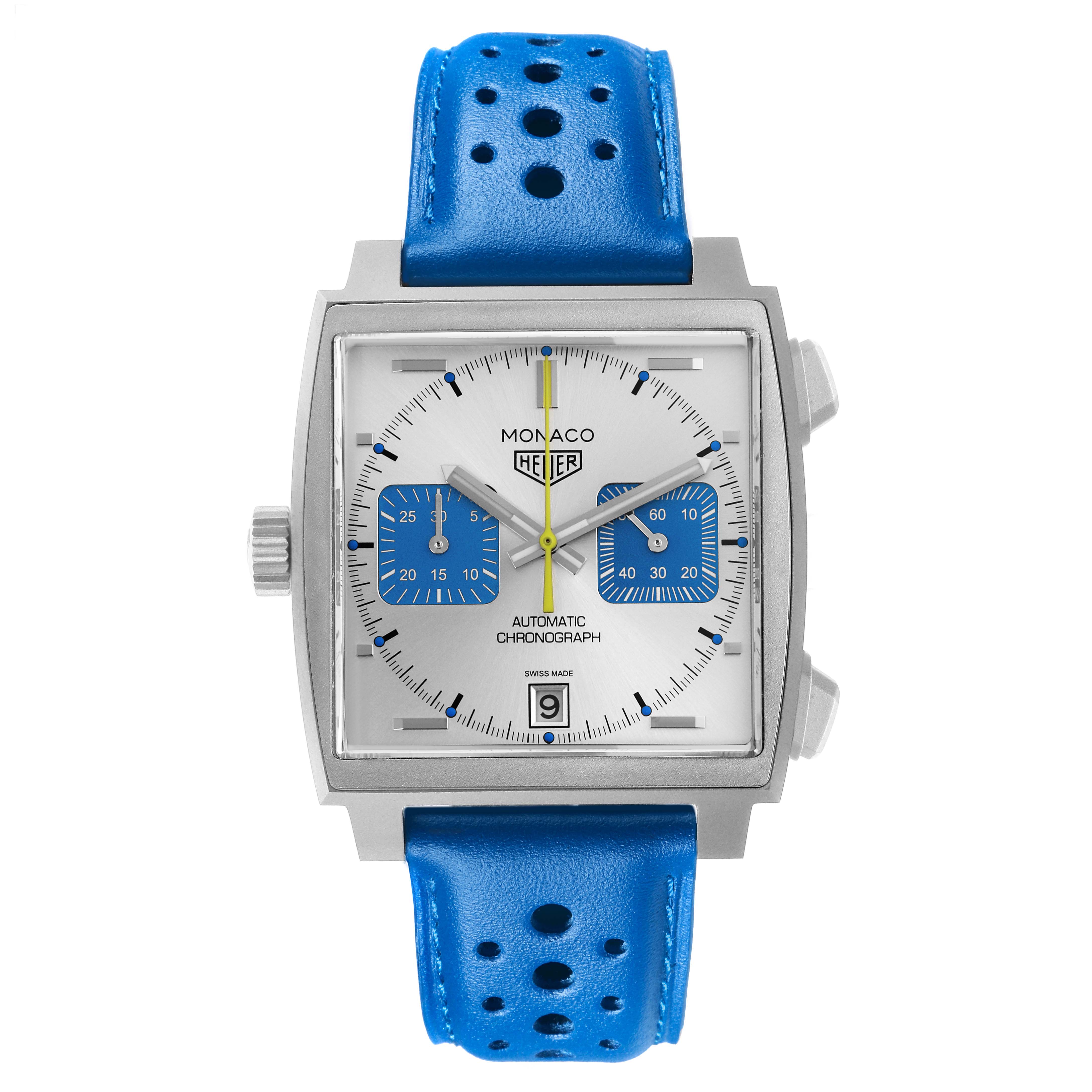 The Tag Heuer Monaco CAW218C.FC6548 Men's Titanium Silver Dial CAW218C.FC6548 Men's Titanium Silver Dial watch is shown from the front, displaying the face, blue subdials, and perforated blue strap.