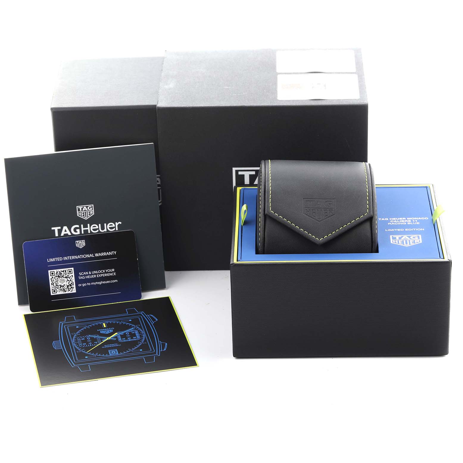 The image shows a Tag Heuer Monaco CAW218C.FC6548 Men's Titanium Silver Dial CAW218C.FC6548 Men's Titanium Silver Dial watch box, warranty card, and packaging from a front angle.