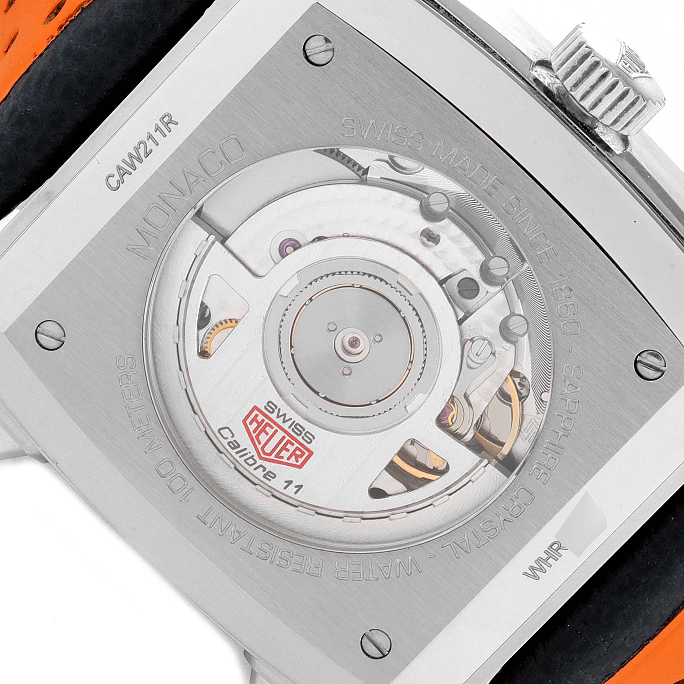 The image shows the back view of the Tag Heuer Monaco CAW211R.FC6401 Men's Stainless Steel Blue Dial CAW211R.FC6401 Men's Stainless Steel Blue Dial, highlighting the movement mechanism and engravings.