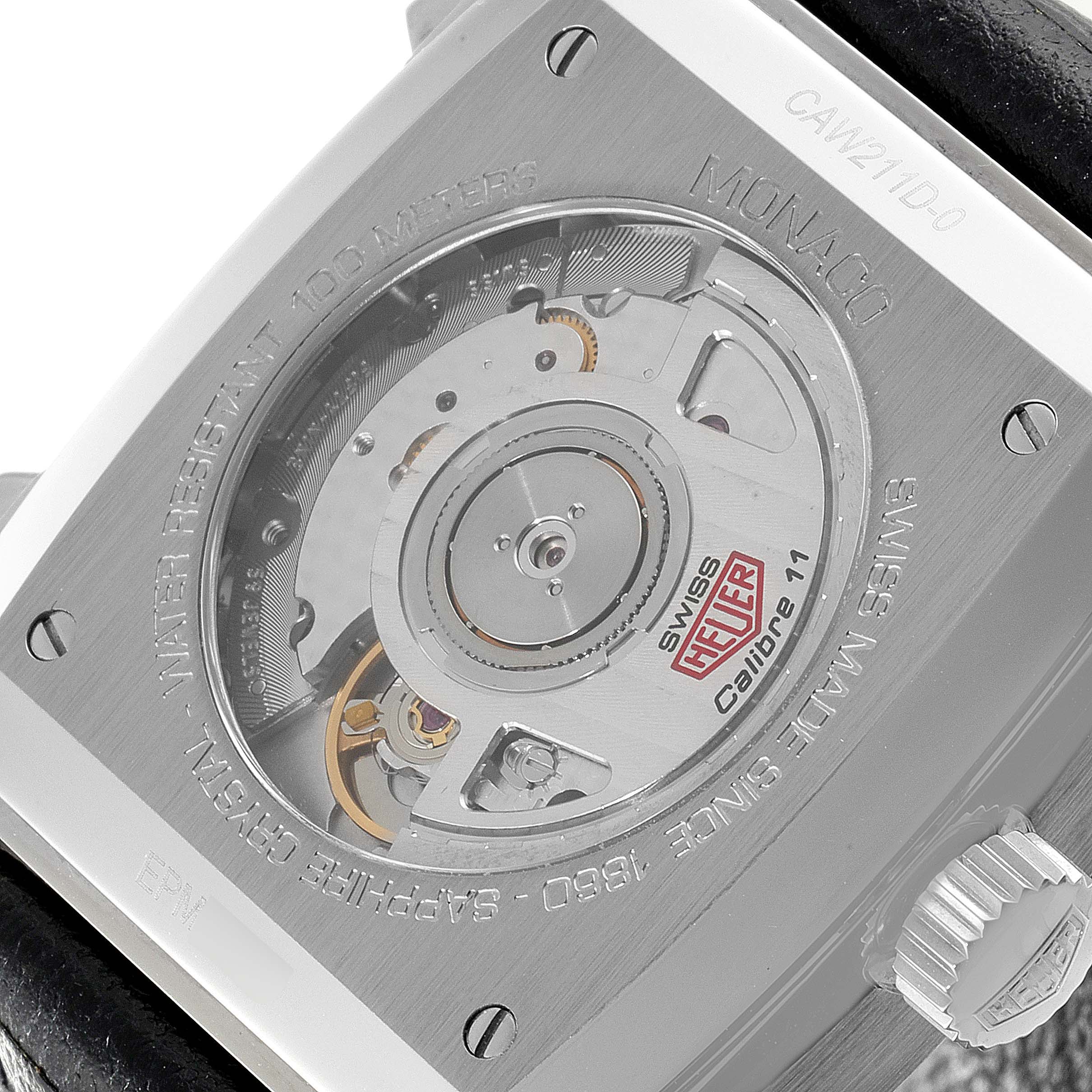 The image shows the back view of the Tag Heuer Monaco Limited Edition watch, highlighting its movement and rotor.