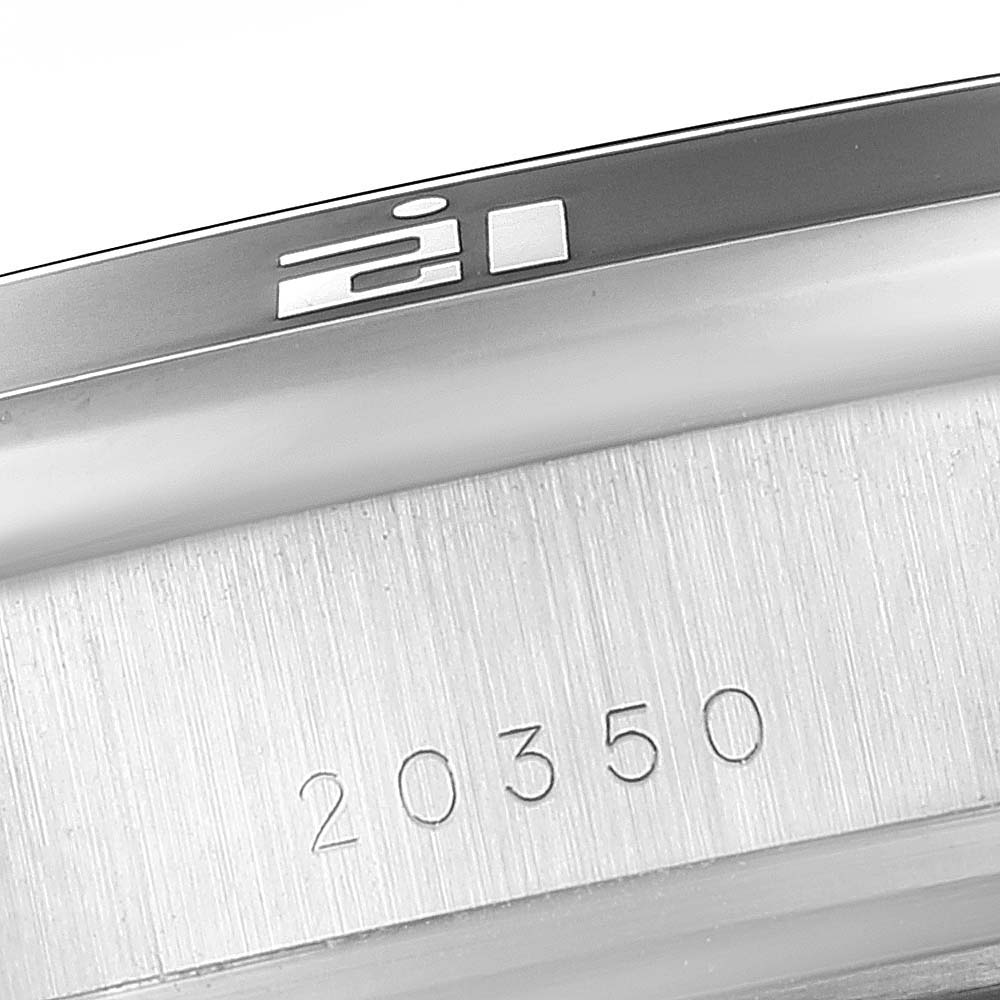 This image shows a close-up of the bezel and case with the serial number "20350" of a Tudor Grantour 20350N-BKSLPL Men's Stainless Steel Black Dial 20350N-BKSLPL Men's Stainless Steel Black Dial model watch.