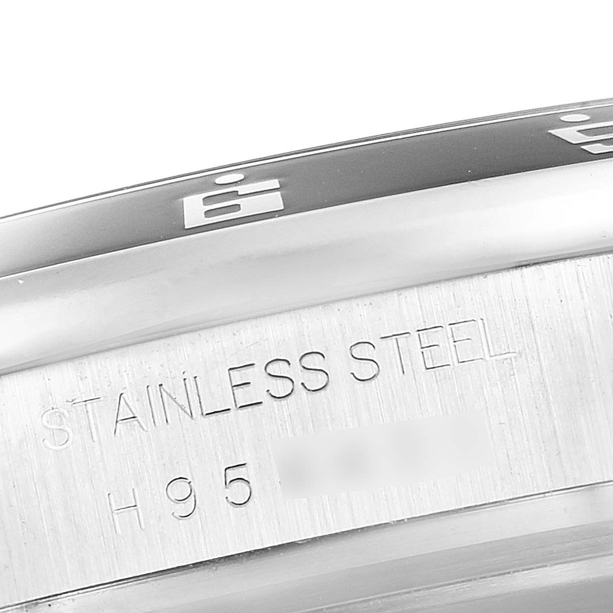 The image shows a close-up of the stainless steel bezel and case of the Tudor Grantour 20350N-BKSLPL Men's Stainless Steel Black Dial 20350N-BKSLPL Men's Stainless Steel Black Dial watch.