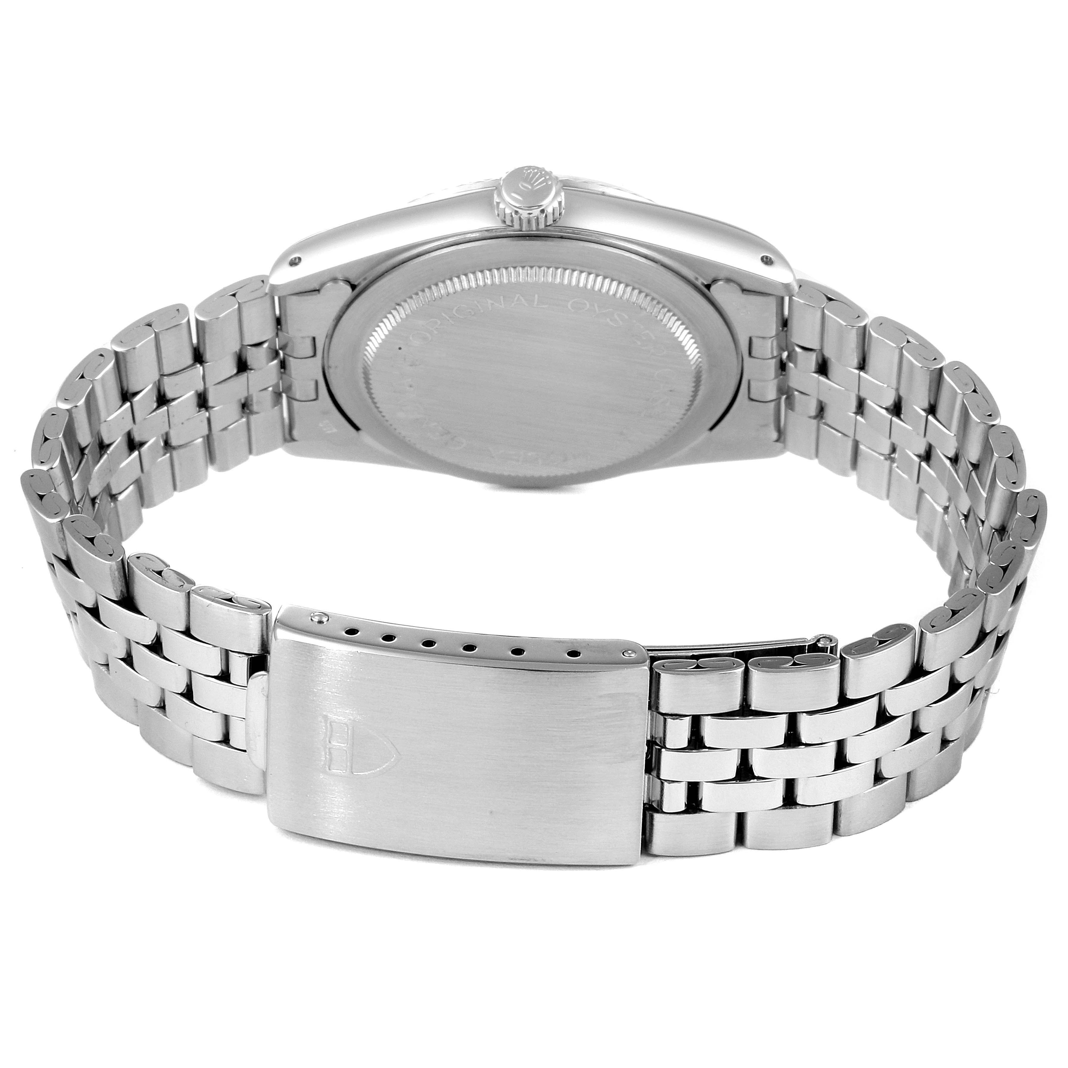 The image shows the back of the Tudor Prince 74034 Men's Stainless Steel Silver Dial 74034 Men's Stainless Steel Silver Dial watch, featuring its case, crown, and stainless steel bracelet with a clasp.