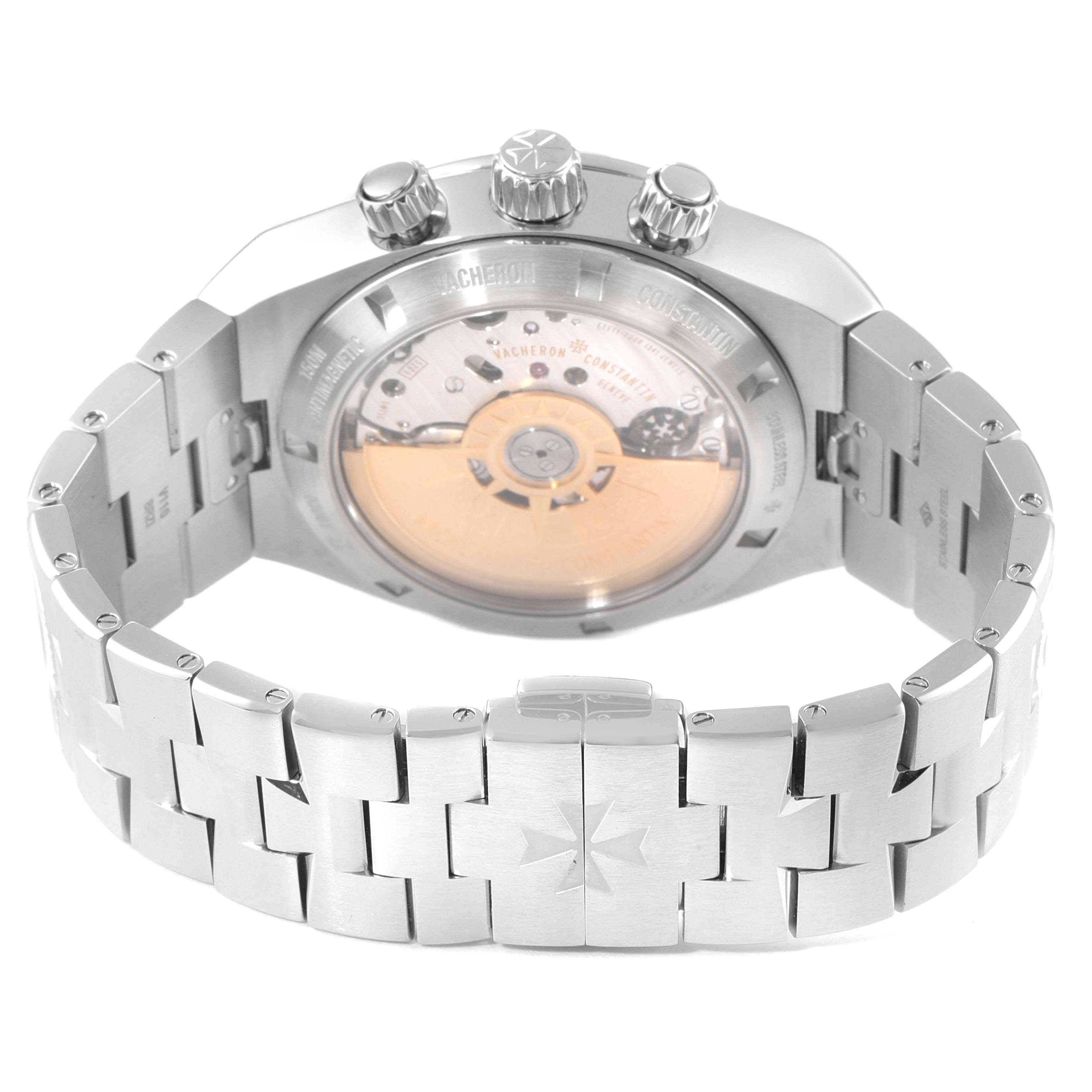 The image shows the back view of a Vacheron Constantin Overseas 5500V/110A-B481 Men's Stainless Steel Black Dial 5500V/110A-B481 Men's Stainless Steel Black Dial watch, focusing on the movement and bracelet.