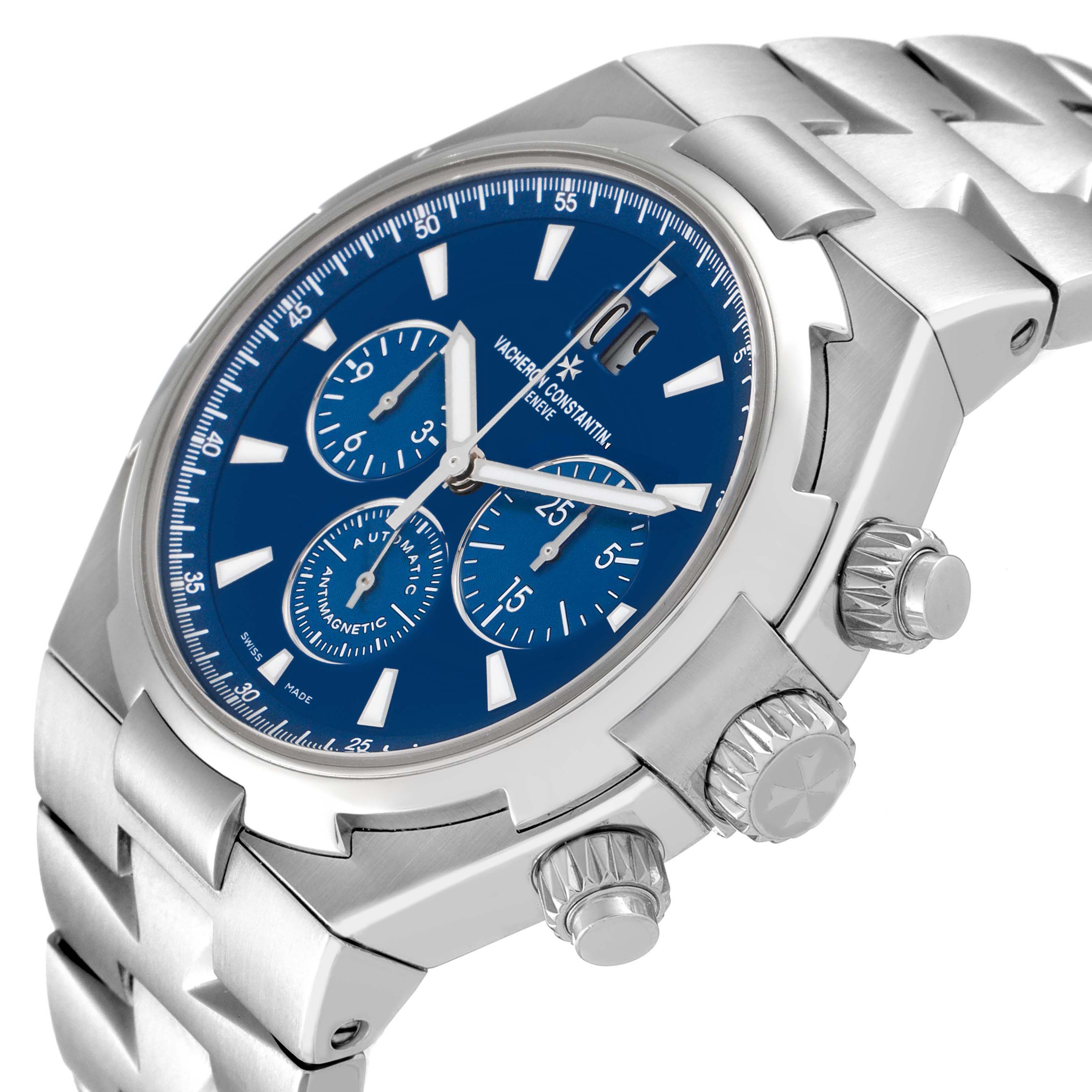 The Vacheron Constantin Overseas 49150/000A-9745 Men's Stainless Steel Blue Dial model is shown at an angle highlighting the blue dial, subdials, crown, and stainless steel bracelet.