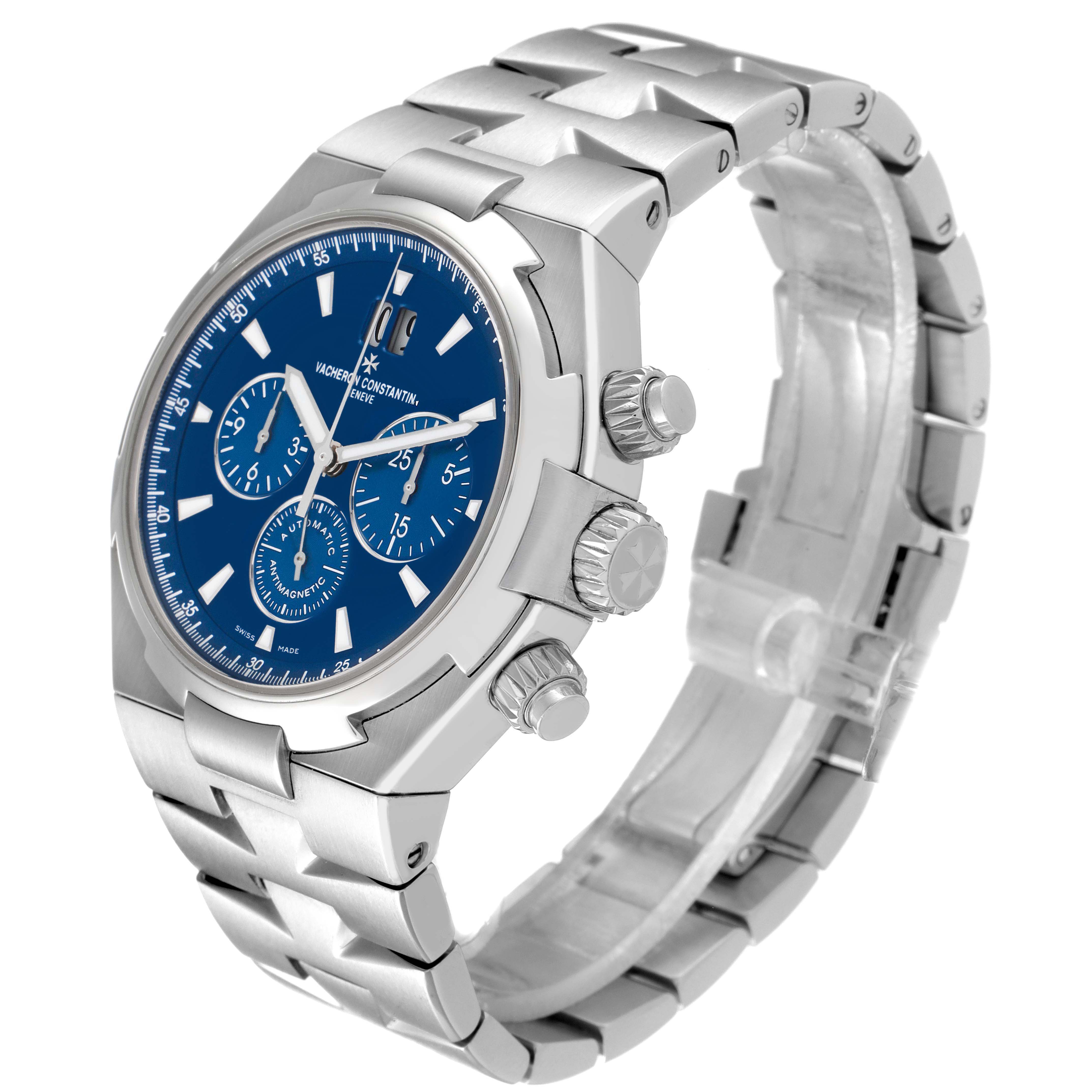 The Vacheron Constantin Overseas 49150/000A-9745 Men's Stainless Steel Blue Dial watch is shown at a three-quarter angle, highlighting the blue dial, pushers, crown, and bracelet.