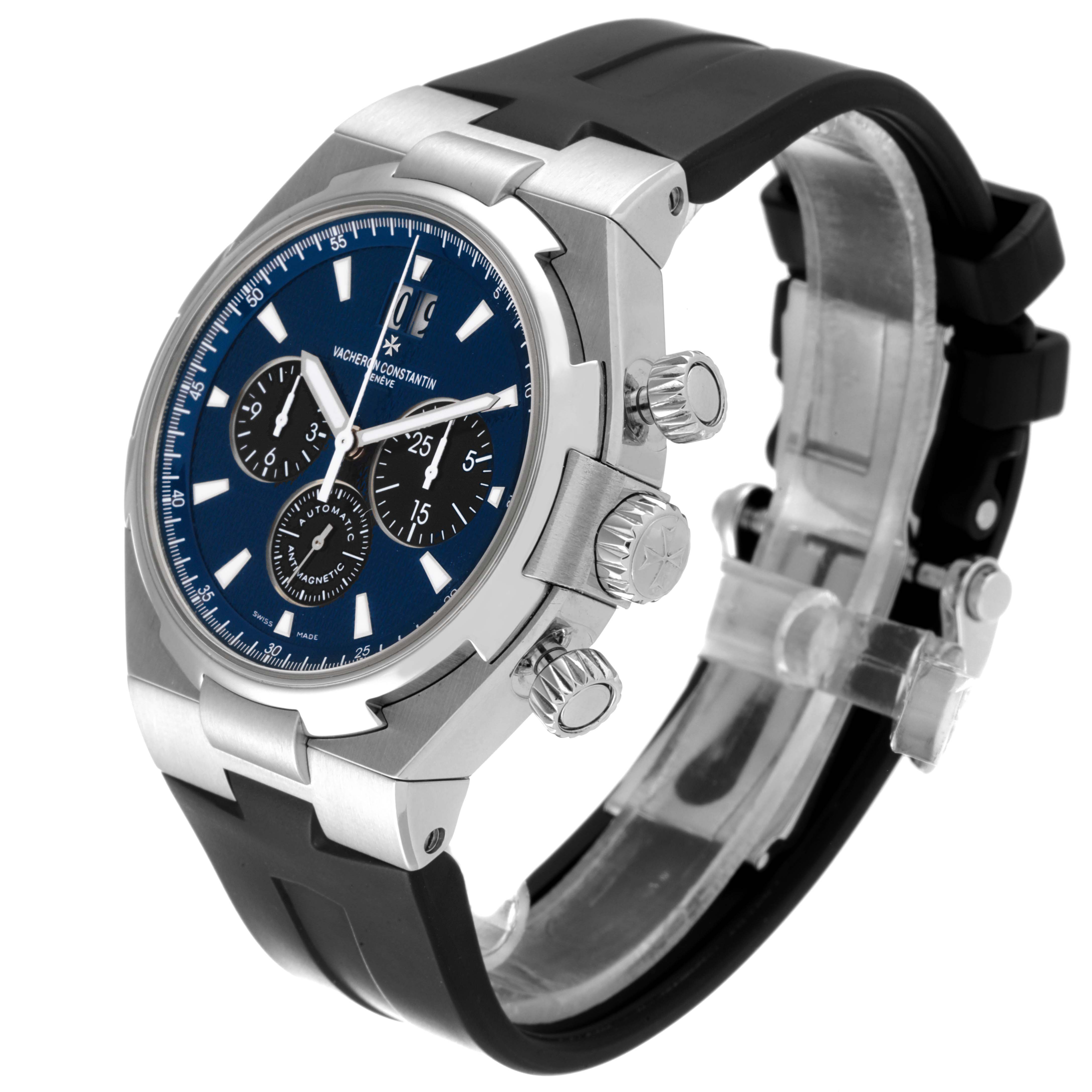 The Vacheron Constantin Overseas 49152/000A-9540 Men's Stainless Steel Blue Dial 49152/000A-9540 Men's Stainless Steel Blue Dial watch is shown at an angle displaying the face, crown, pushers, and rubber strap.